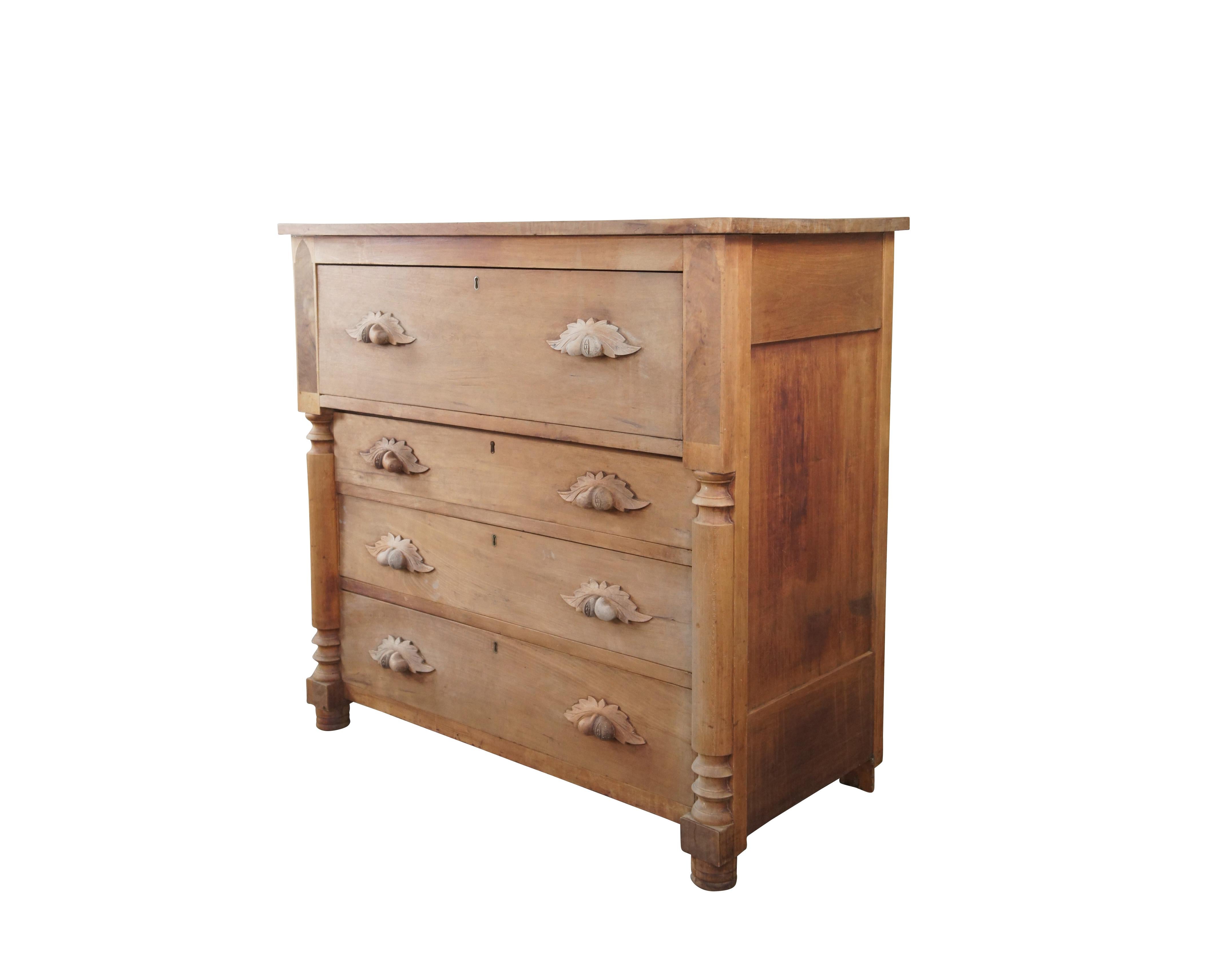 Antique 19th century American Victorian cherry tallboy dresser or chest of drawers. An unfinished rustic frame with 4 hand dovetailed drawers and fruit and nut pulls. Features quarter cut turned stiles and ribbed feet. Size: 44