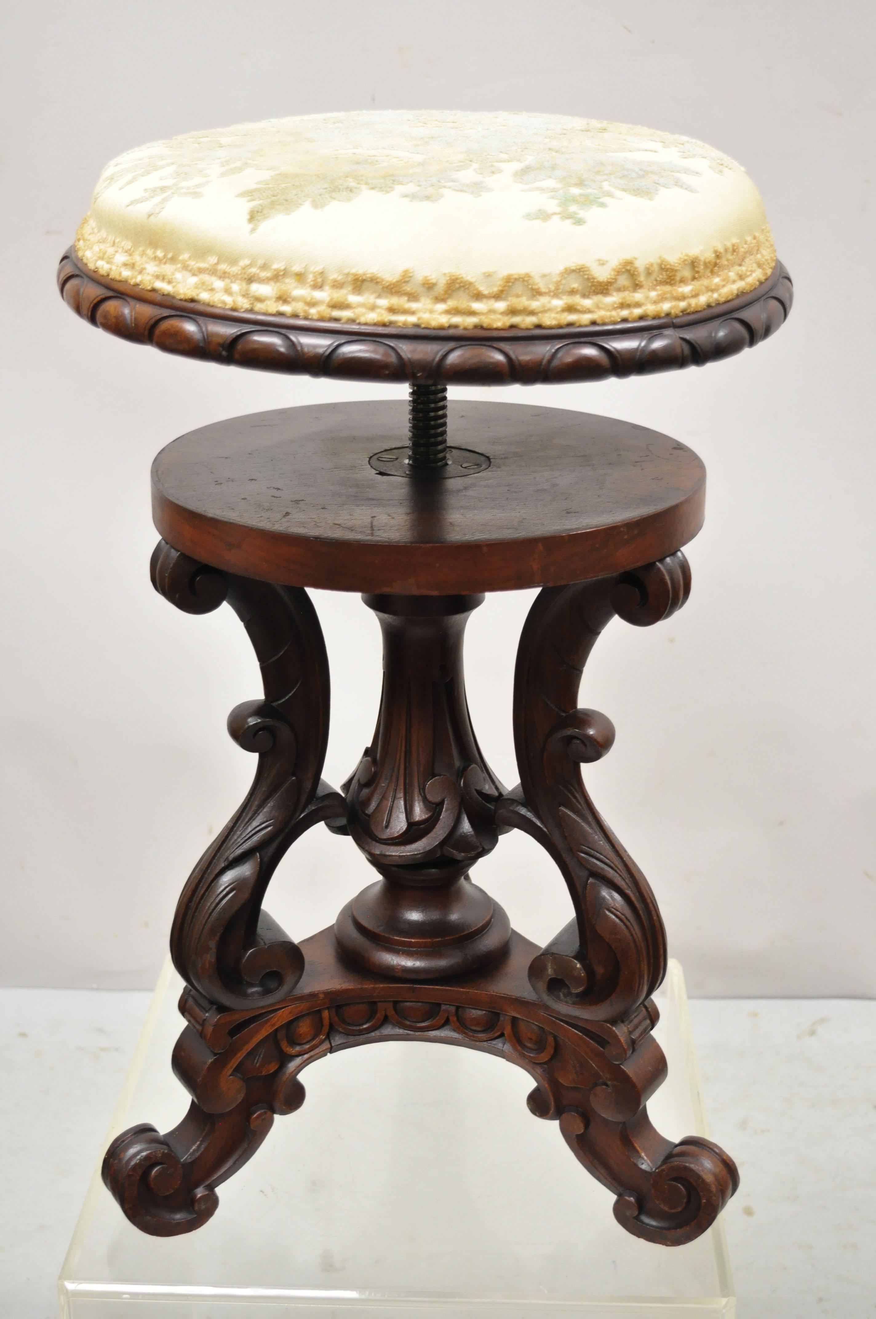Antique 19th Century carved Walnut Victorian adjustable height pedestal base stool. Item features adjustable height seat, solid wood frame, nicely carved details, very nice antique item, quality craftsmanship, great style and form. Circa 19th