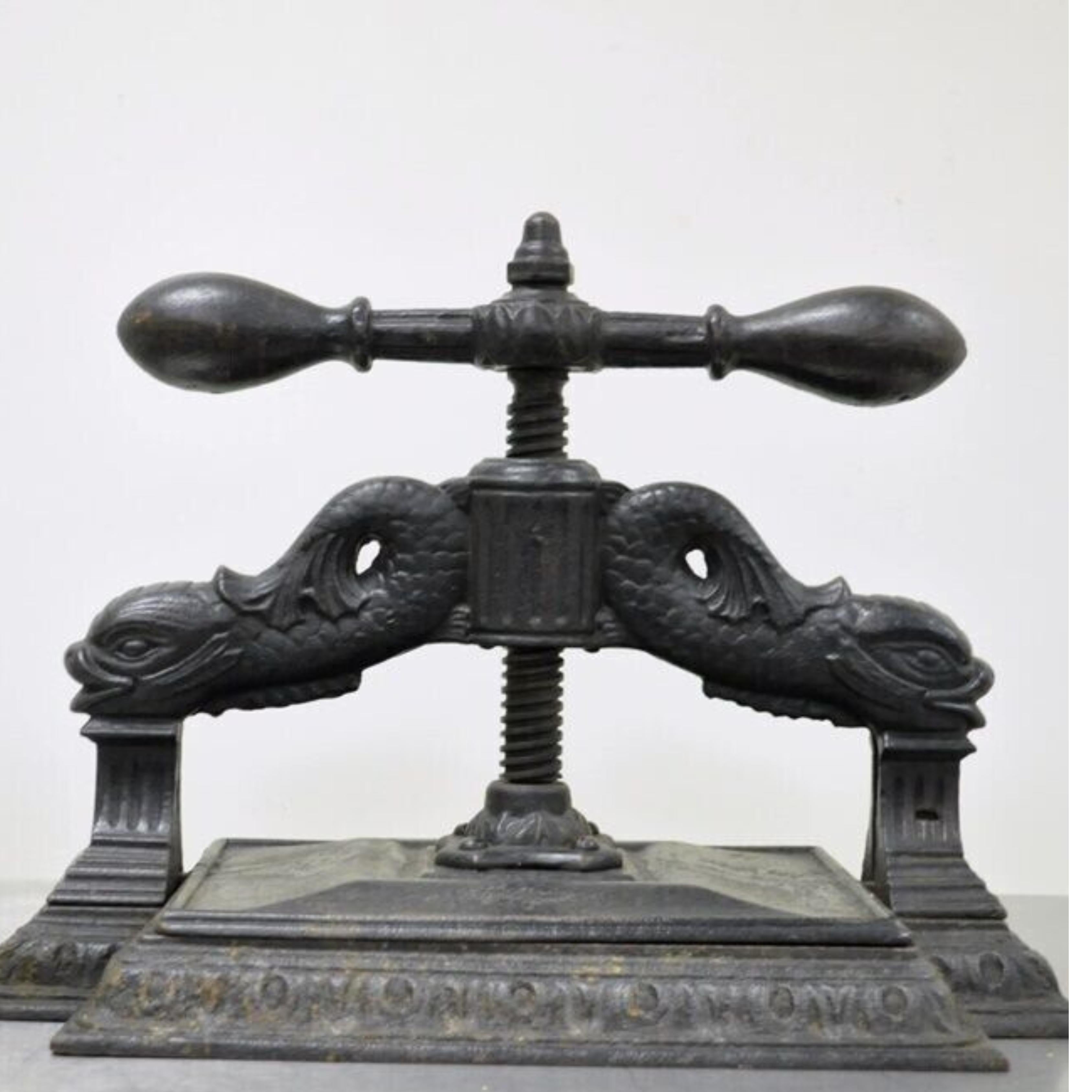 Antique 19th C. Cast Iron Classical Figural Dolphin Victorian Book Press. Item features Intricate supports with dolphins and fluted columns, acanthus accented base, substantial and heavy in weight, believed to be by Russell Erwin Manufacturing Co.