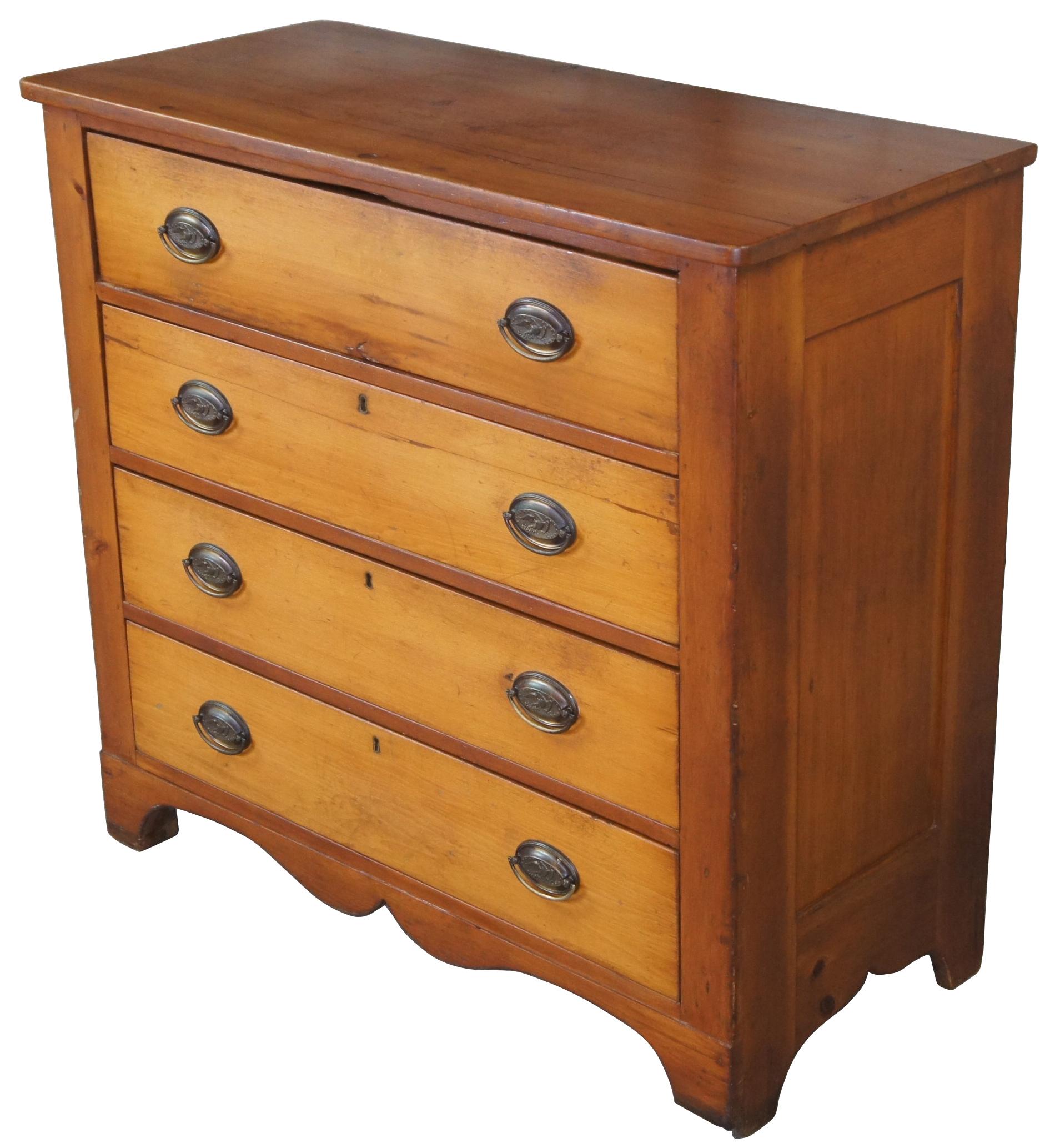 Late 19th century American pine dresser. Rectangular form with four drawers featuring sheraton American Eagle drawer hardware. 
 