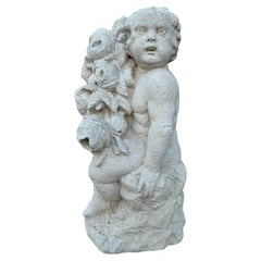 Statue de jardin française ancienne du 19ème siècle, sculptée à la main, en pierre calcaire, chérubin ou putti