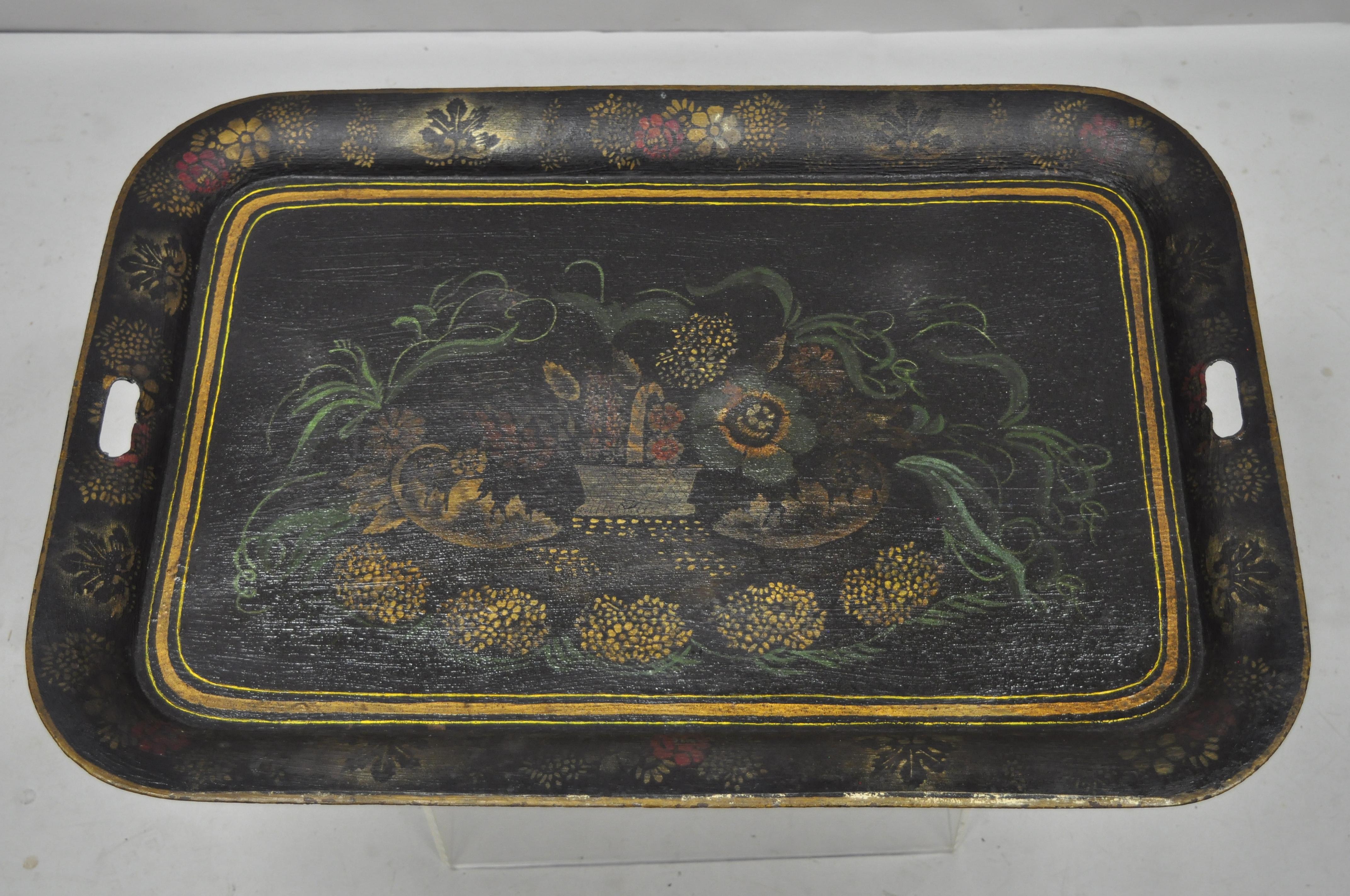 Antique 19th century French Victorian hand painted flowers tole metal toleware tray. Item features original hand painted finish, remarkable age and patina, twin handle cut-outs, very impressive antique tray, circa 19th century. Measurements: 1.5