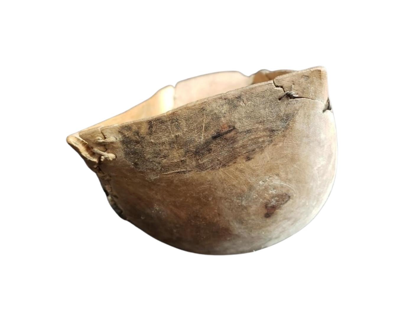Antique 19th C. Primitive Hand-Carved Wooden Dough Bowl with Stitch Repairs In Good Condition For Sale In West Hollywood, CA