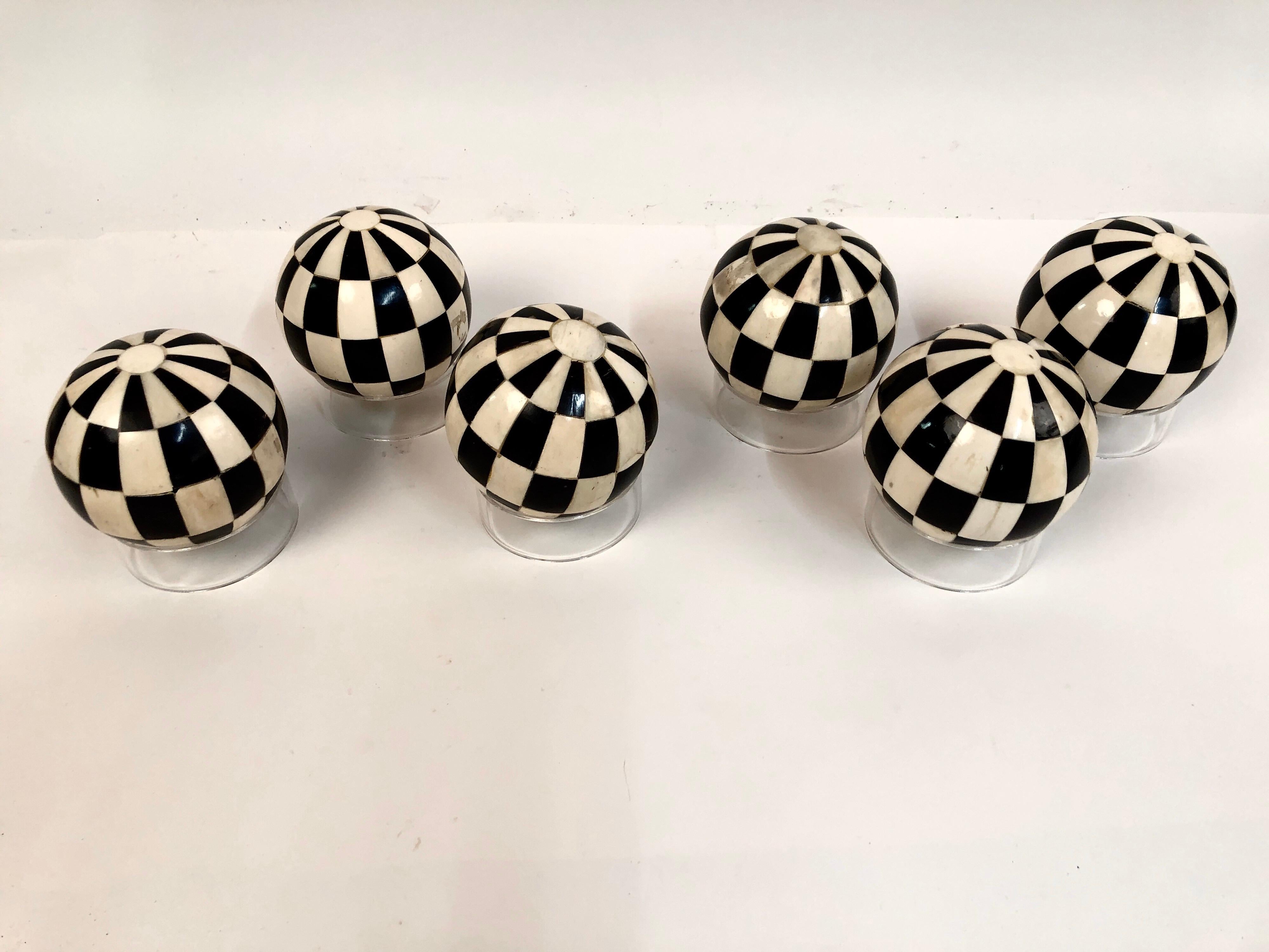 A collection of 6 late 19th century antique Victorian game carpet balls all created in a striking geometric pattern. Made of pieced horn and bone. Used in an indoor parlor game similar to Bocce. They were made for adults not children. All six come