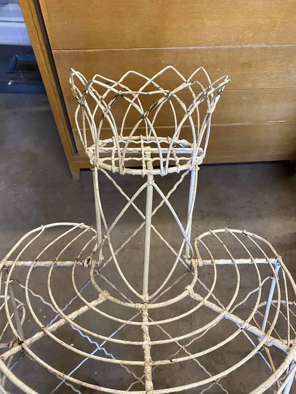 antique wire plant stand