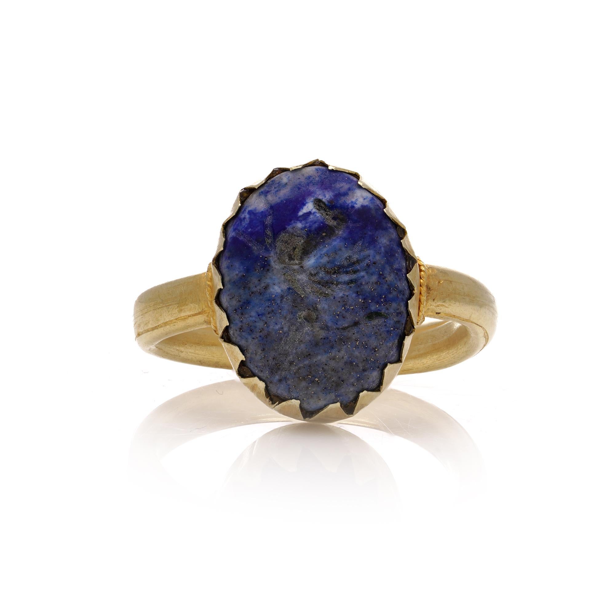 Antique 19th Century 18kt gold lapis lazuli intaglio ring with pegasus carving.
Shank has been added later.

In intaglio rings, Pegasus symbolizes freedom, creativity, and spiritual ascension. Its image evokes the wearer's desire to break free from