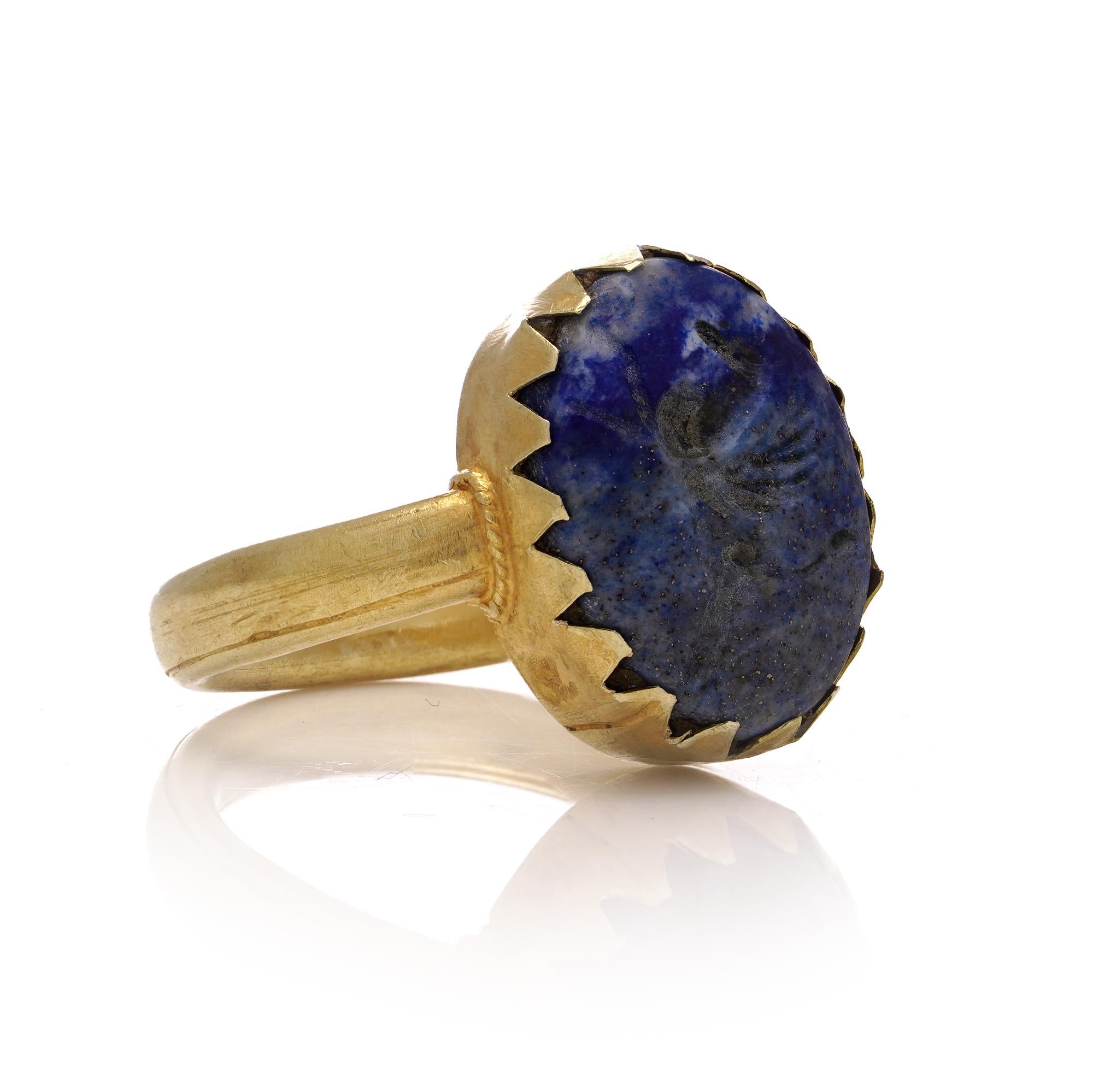 Oval Cut Antique 19th Century 18kt gold lapis lazuli intaglio ring with pegasus carving For Sale