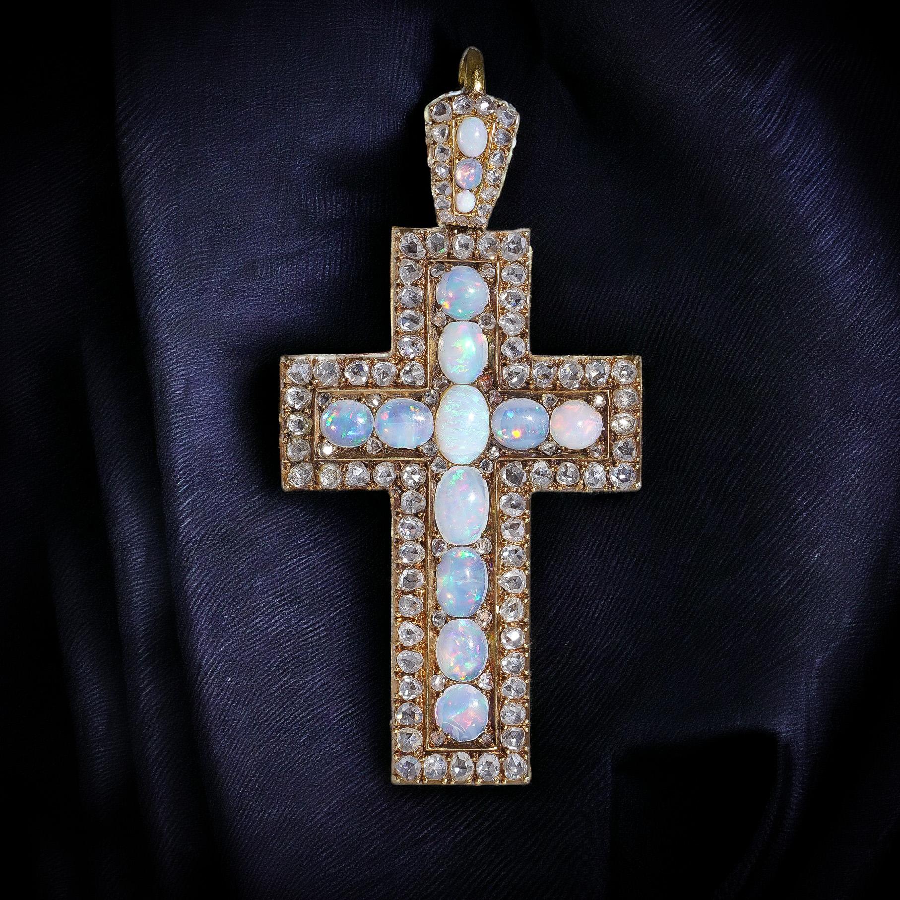 Antique 19th Century 20kt. yellow gold rose-cut diamond and opal cross pendant. 
X-Ray has been tested positive for 20 kt. gold. 

Dimensions - 
Length x width x height: 7.3 x 3.5 x 0.4 cm ( with bail ). 
Weight: 14.7 grams 

Diamonds -
Cut: Rose -