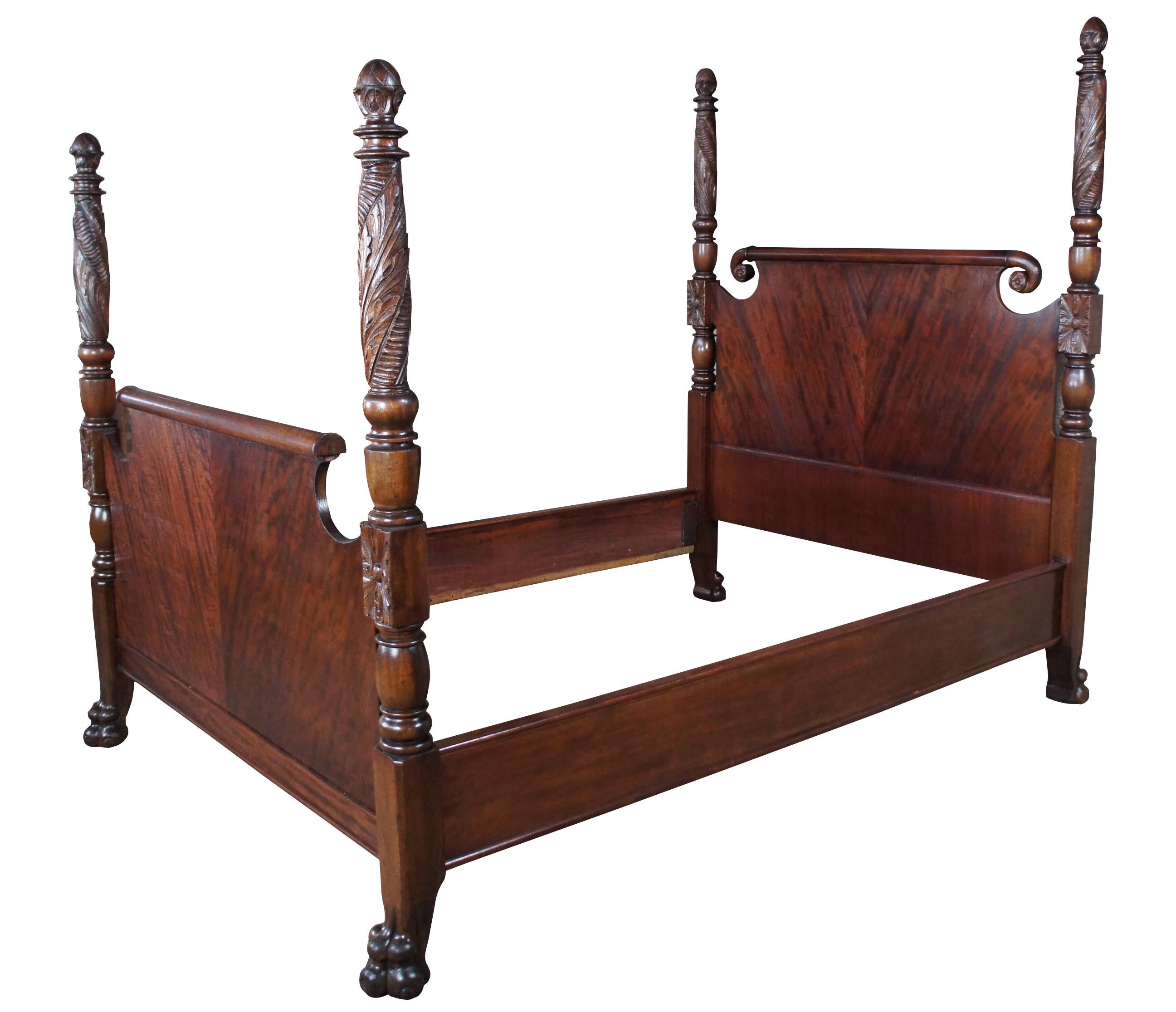 Antique American Empire 4 post full size bed frame, circa 1840s. Made from rich mahogany with a beautiful matchbook 