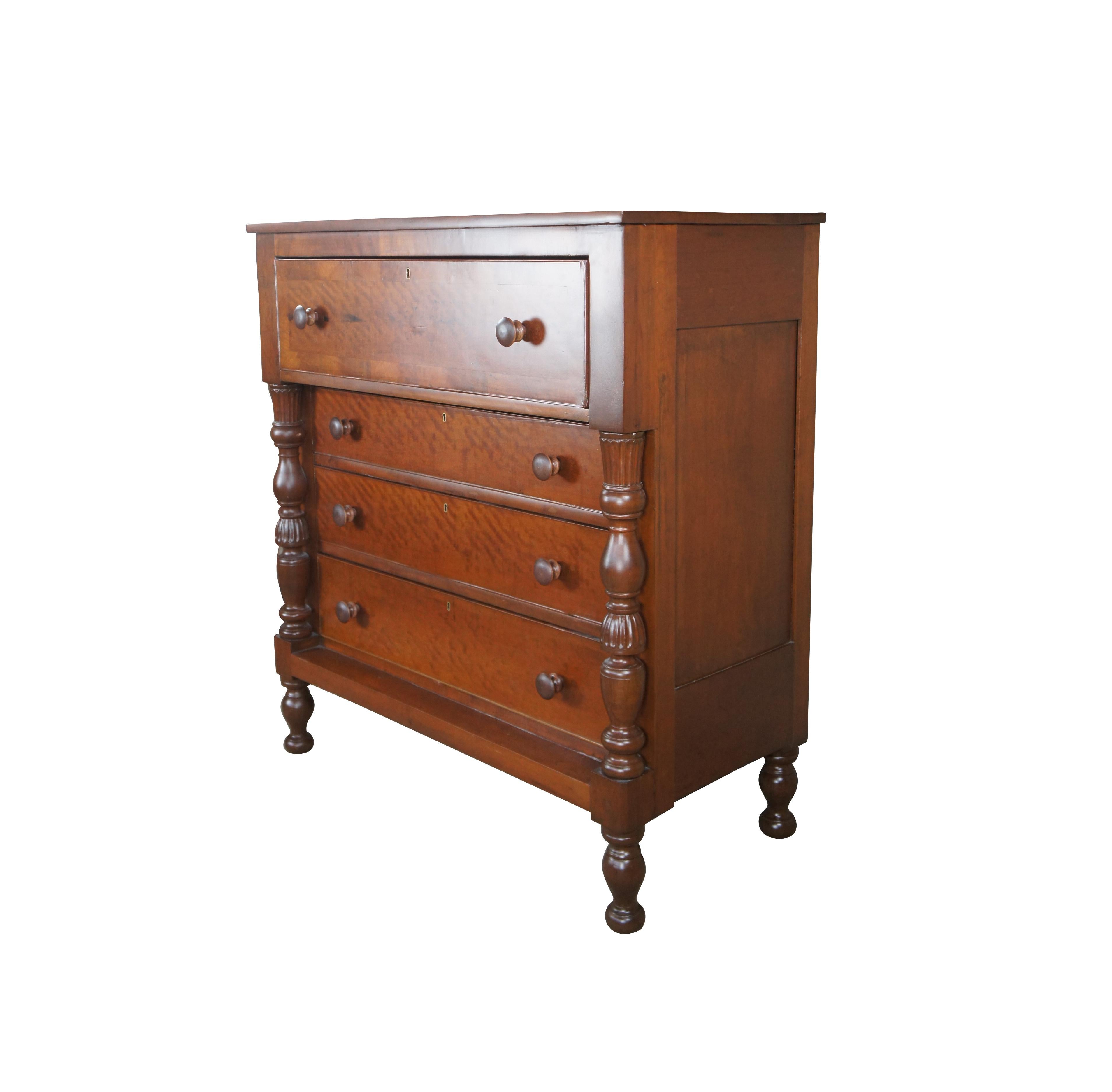 A large and impressive Victorian chest of drawers, circa 1870s. Made from Cherry with walnut banding. Features 4 hand dovetailed drawers with a pronounced top. The stiles showcase whole turned, fluted and ribbed columns. The case is raised over