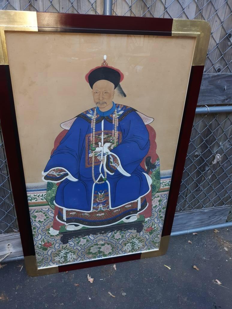 A large Chinese ancestral portrait watercolor on paper. China, Mid-19th century. Beautifully framed in a custom wood frame with gold leaf corners. Measures: 54 inches tall, 34 inches wide.
