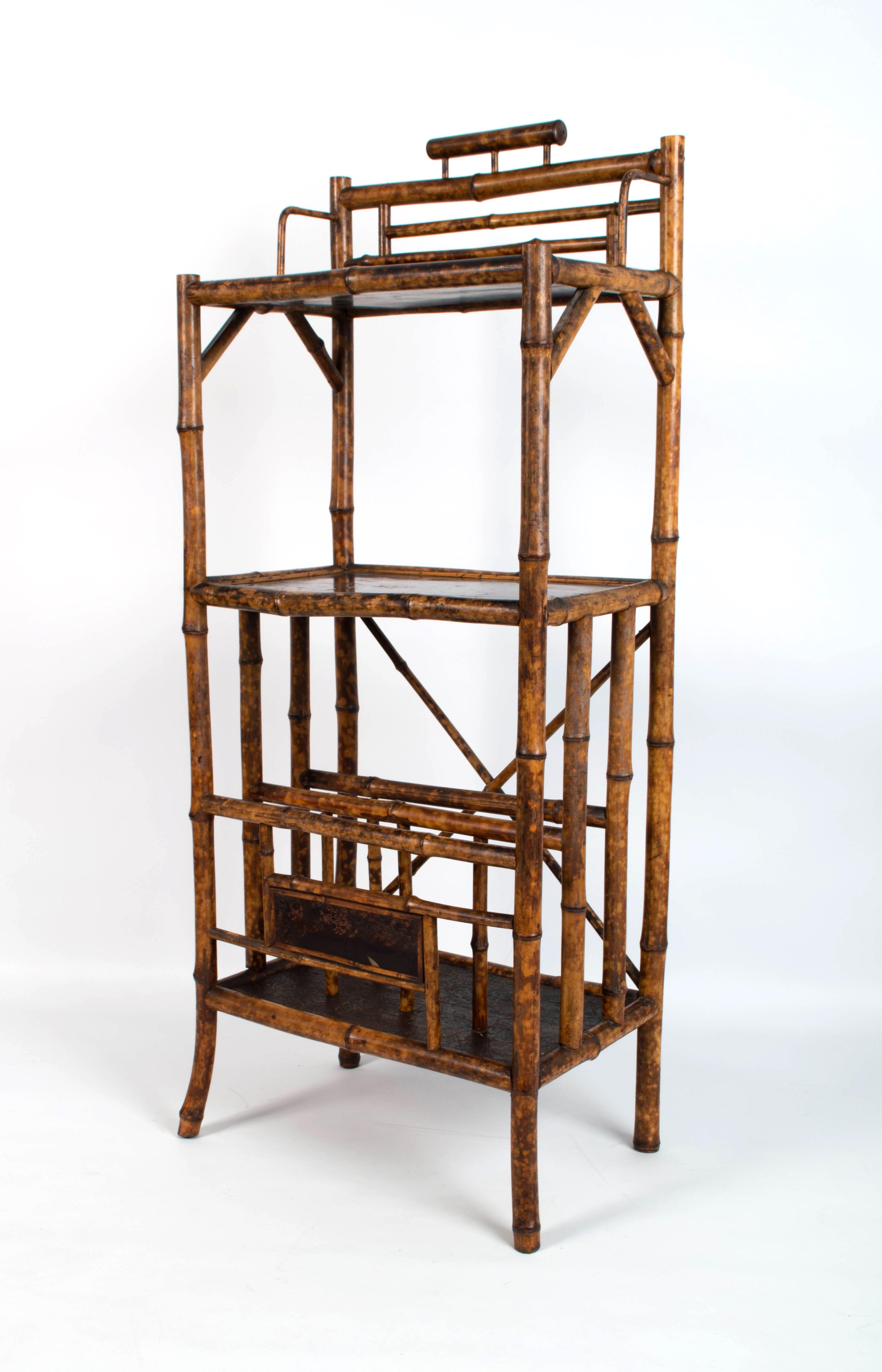 Antique 19th century Anglo-Chinese lacquered bamboo etagere shelves.
C.1880 England

In very good condition, with expected signs of wear commensurate with age.