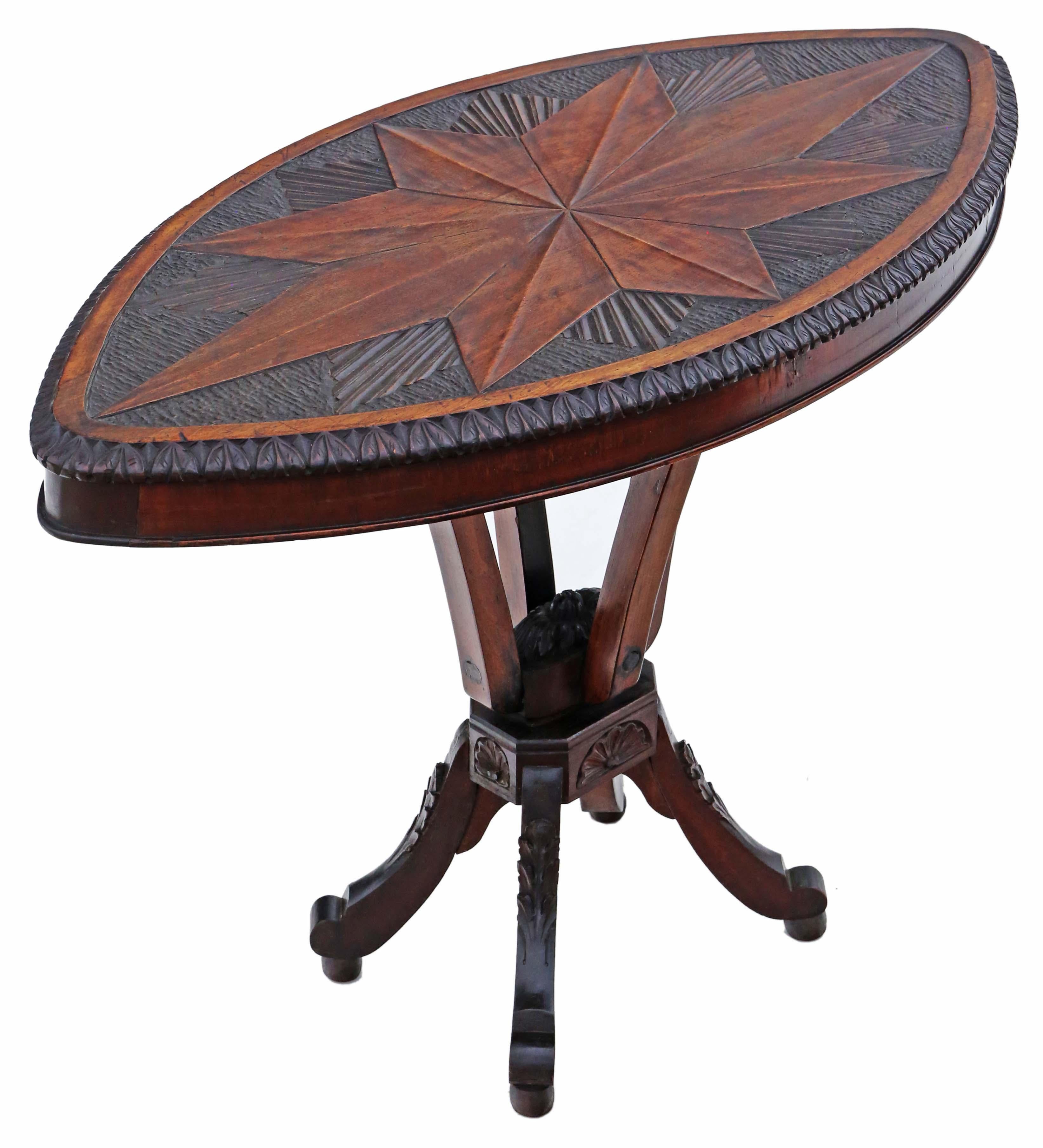 Antique 19th Century Anglo Indian shield shaped centre side occasional coffee table.

Solid with no loose joints. A charming table that is full of age and character with a really great look.

Good colour and patina. Made from Padauk, beech and
