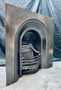 Antique 19th Century Arched Cast Iron Fireplace Insert.