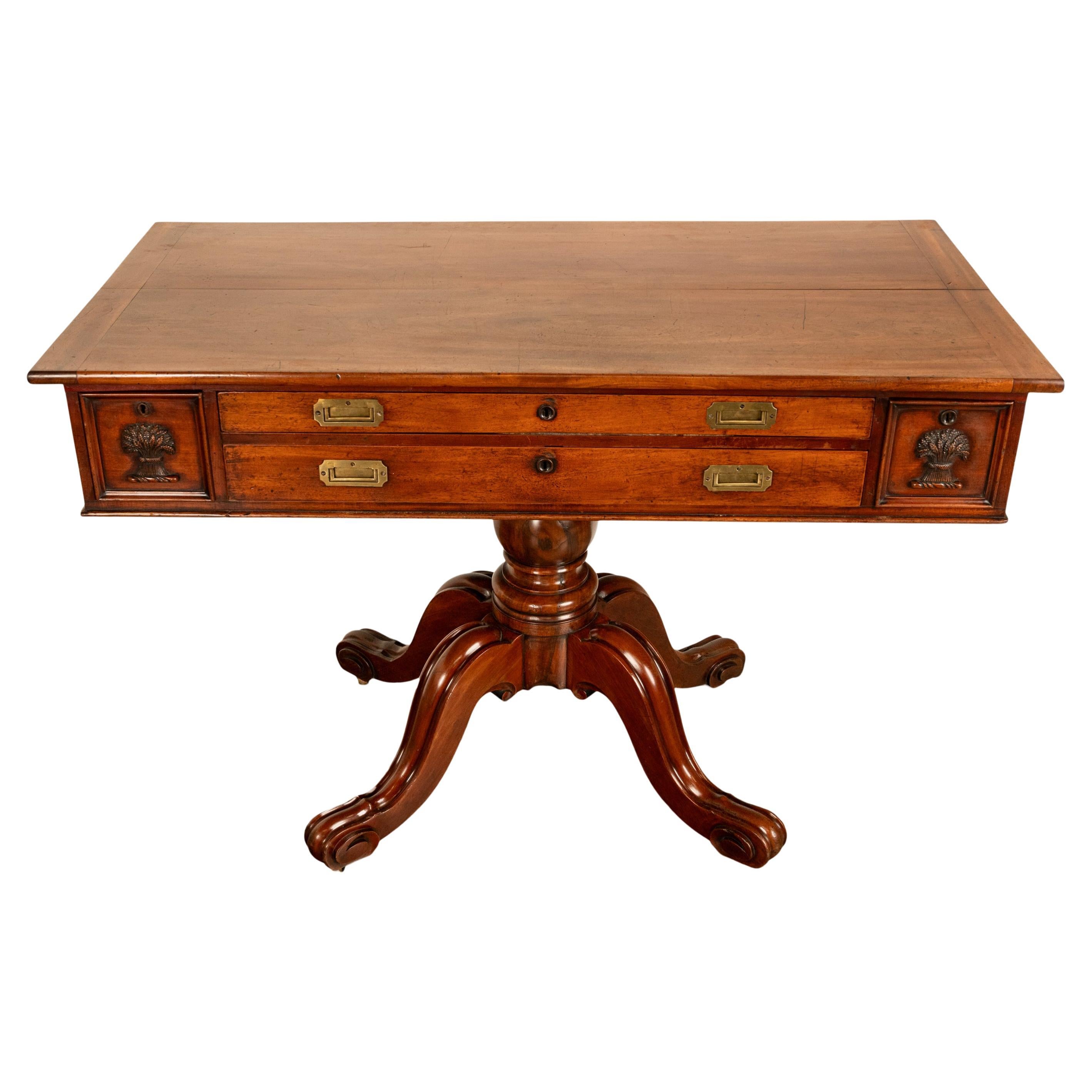 A good and unusual 19th century antique mahogany pedestal architect's drafting table, desk, circa 1870.
The desk/drafting table having a hinged lift up writing/drawing surface that can be elevated or flat. To the front are two wide & deep file