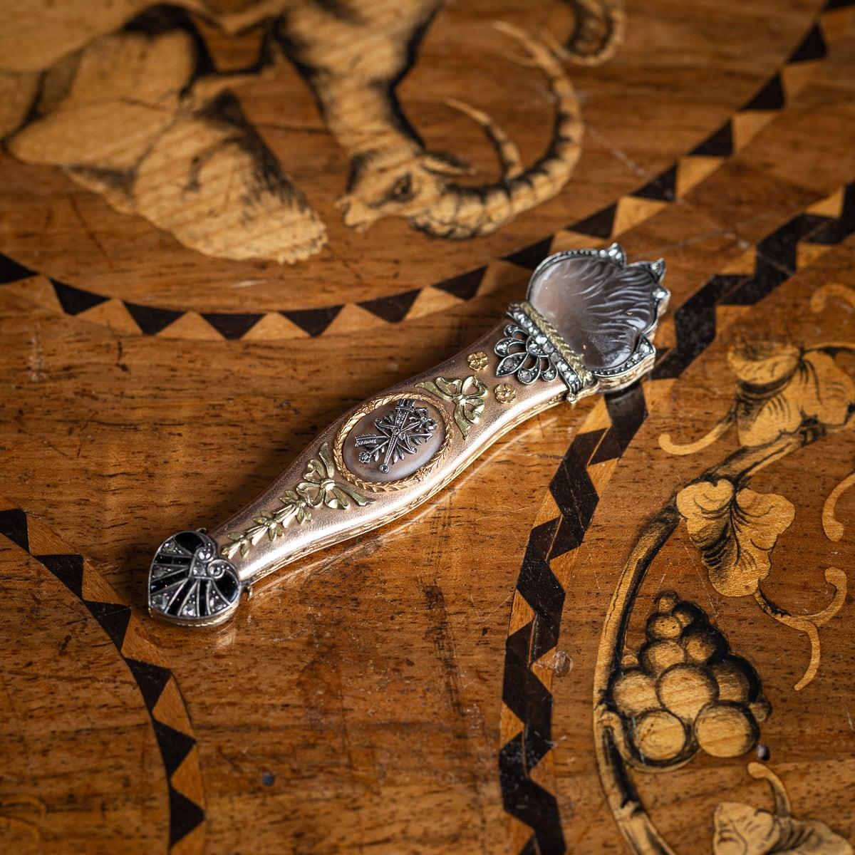 Antique early 19th Century Austrian three colour gold mounted with diamonds and rock crystal toothpick case, styled in a shape of a torch. The hinged lid mounted with a slightly opaque etched rock crystal panels shaped as a flame, with acanthus leaf