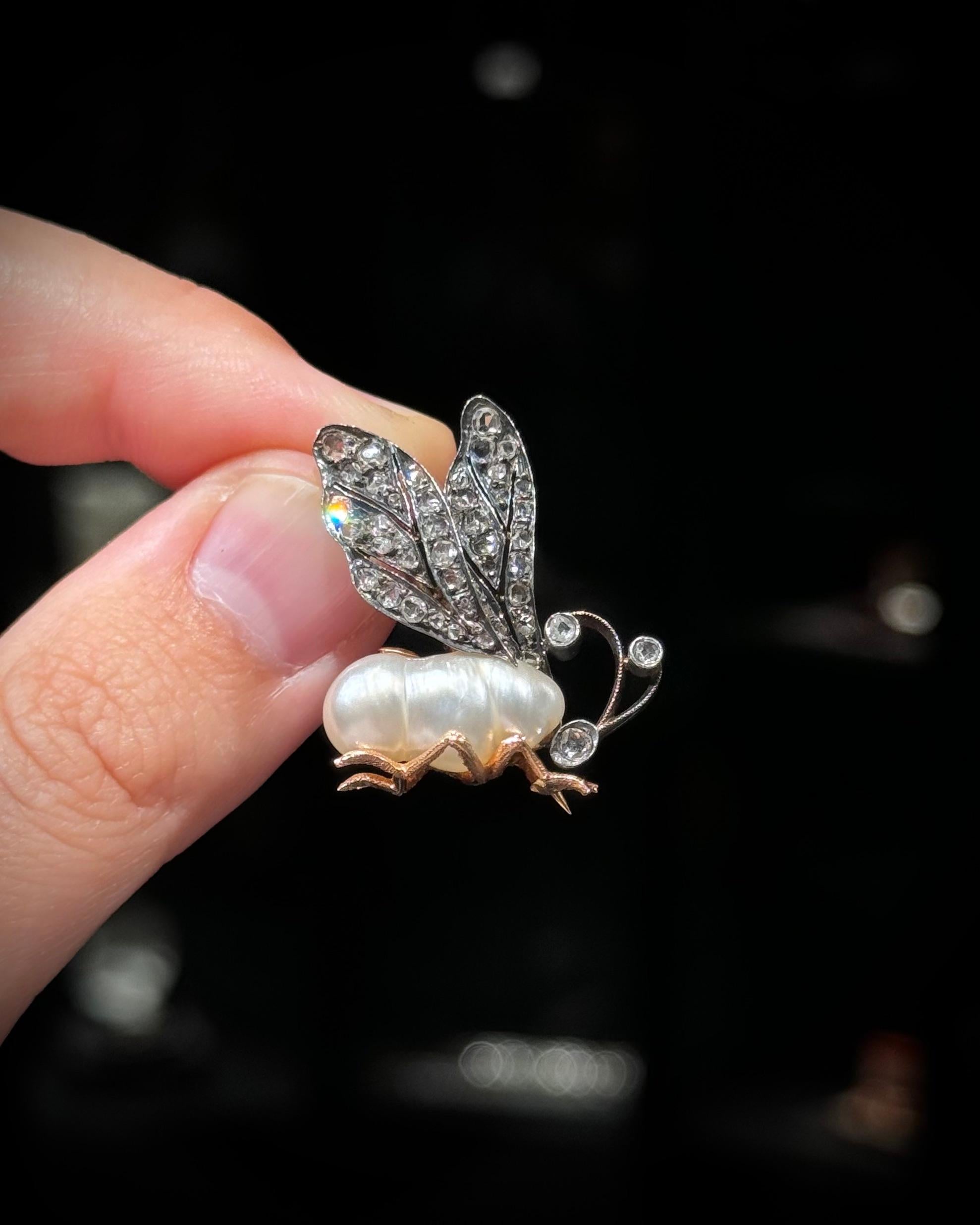 Antique 19th Century Baroque Pearl and Diamond Bee Brooch in Silver and Gold, circa 1880. A poetic example of Victorian naturalism, this antique bee brooch from the late 19th century is exquisitely crafted in silver and rose gold, combining