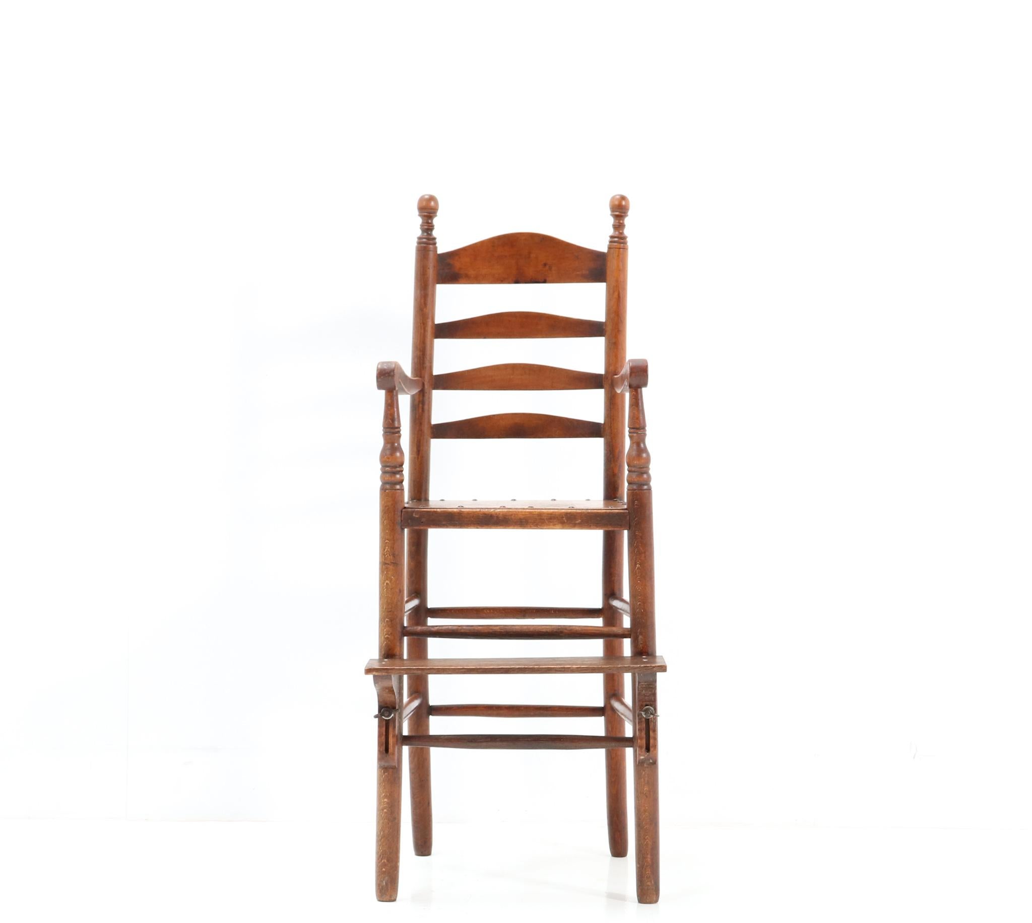 Stunning and rare Antique Country children's ladder back chair.
Striking Dutch design from the 1890s.
Solid beech frame with original adjustable feet support.
This wonderful Antique Country children's ladder back chair is in
very good condition