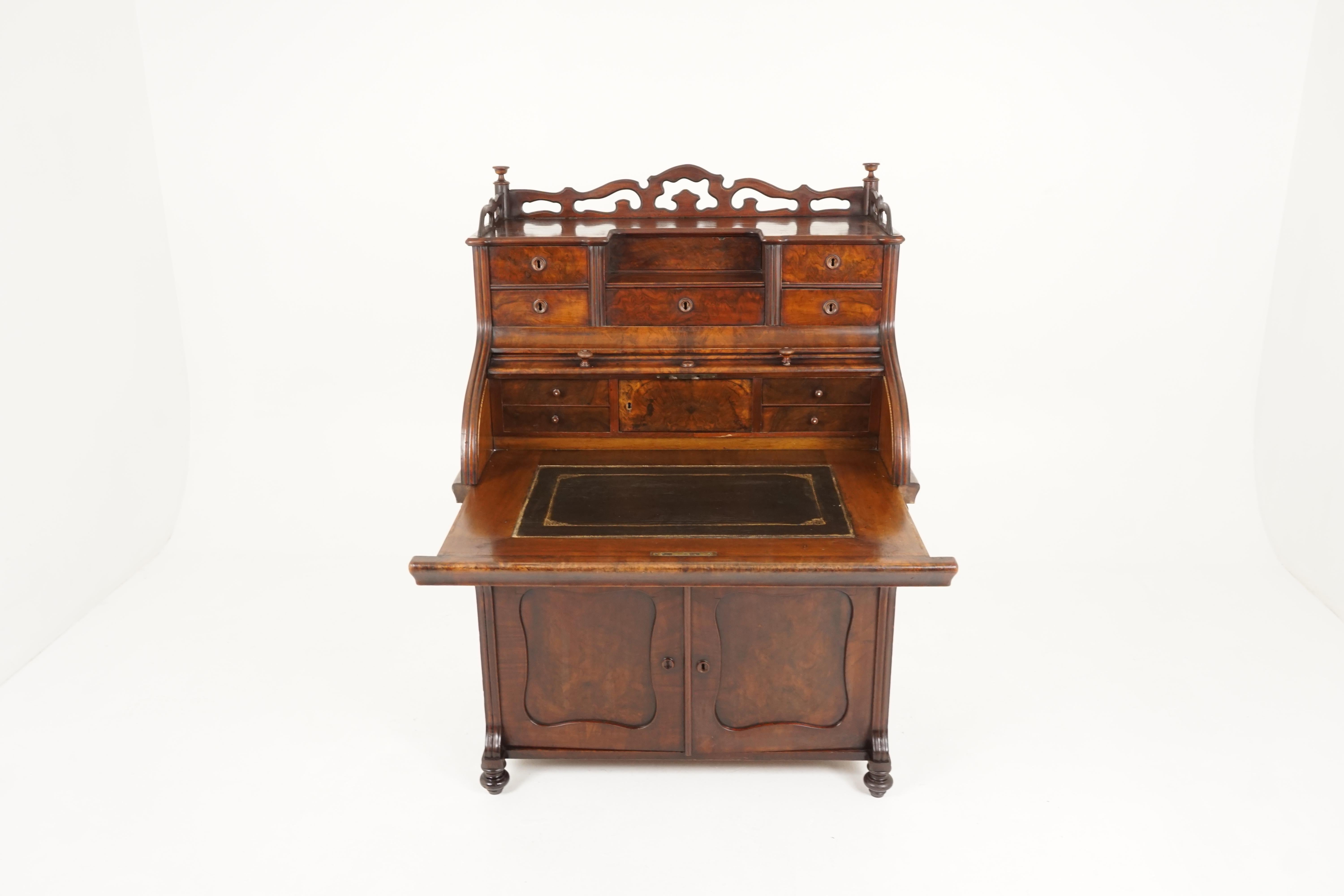 Antique 19th century Biedermeier roll top walnut secrétaire, writing desk, continental 1870, B2257

Continental, 1970
Solid walnut and veneer
Original finish
Three quarter open gallery on top
Five drawers and a center door with secret opening device