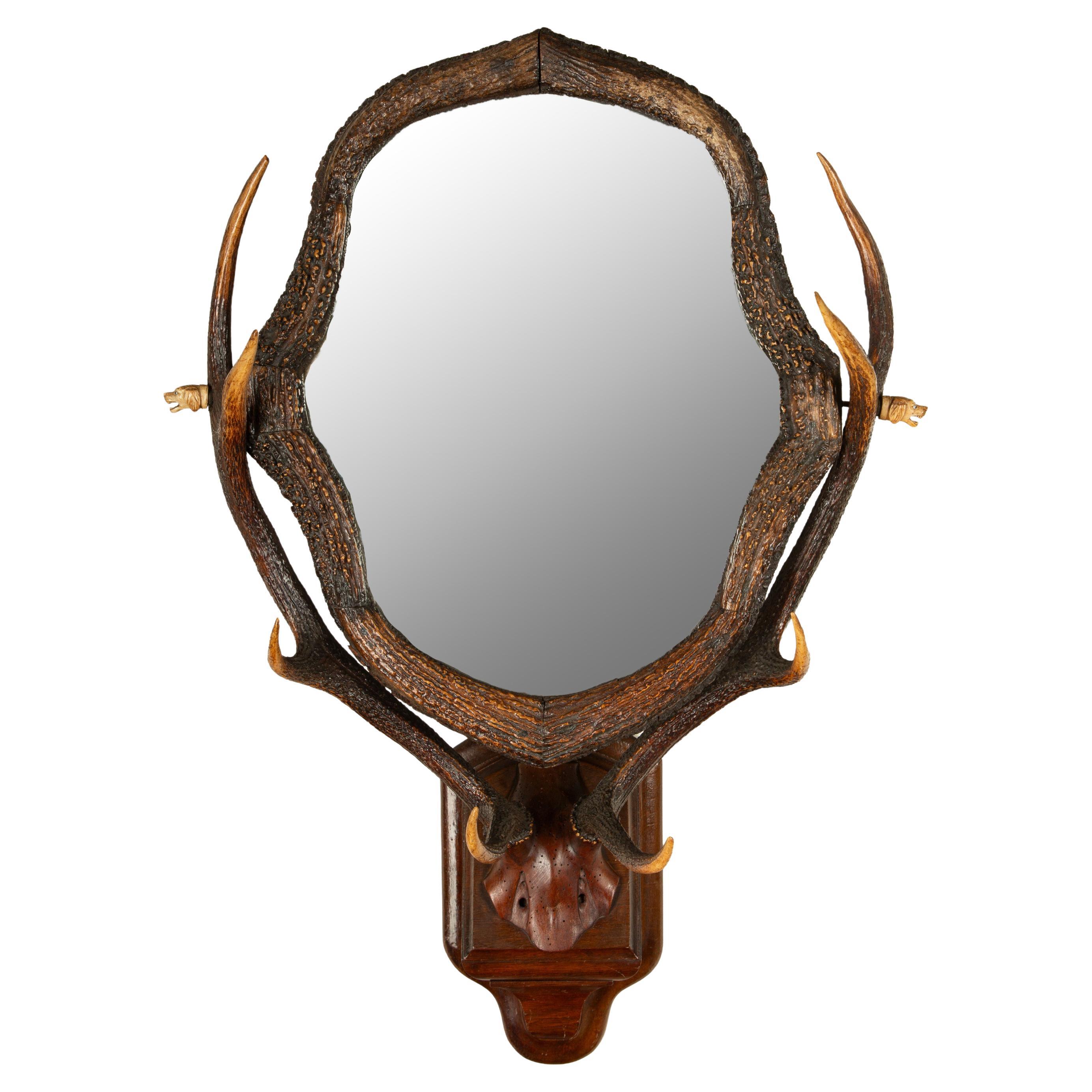 Antique 19th Century Black Forest Stag Antler Mirror with Carved Bone Dog Heads