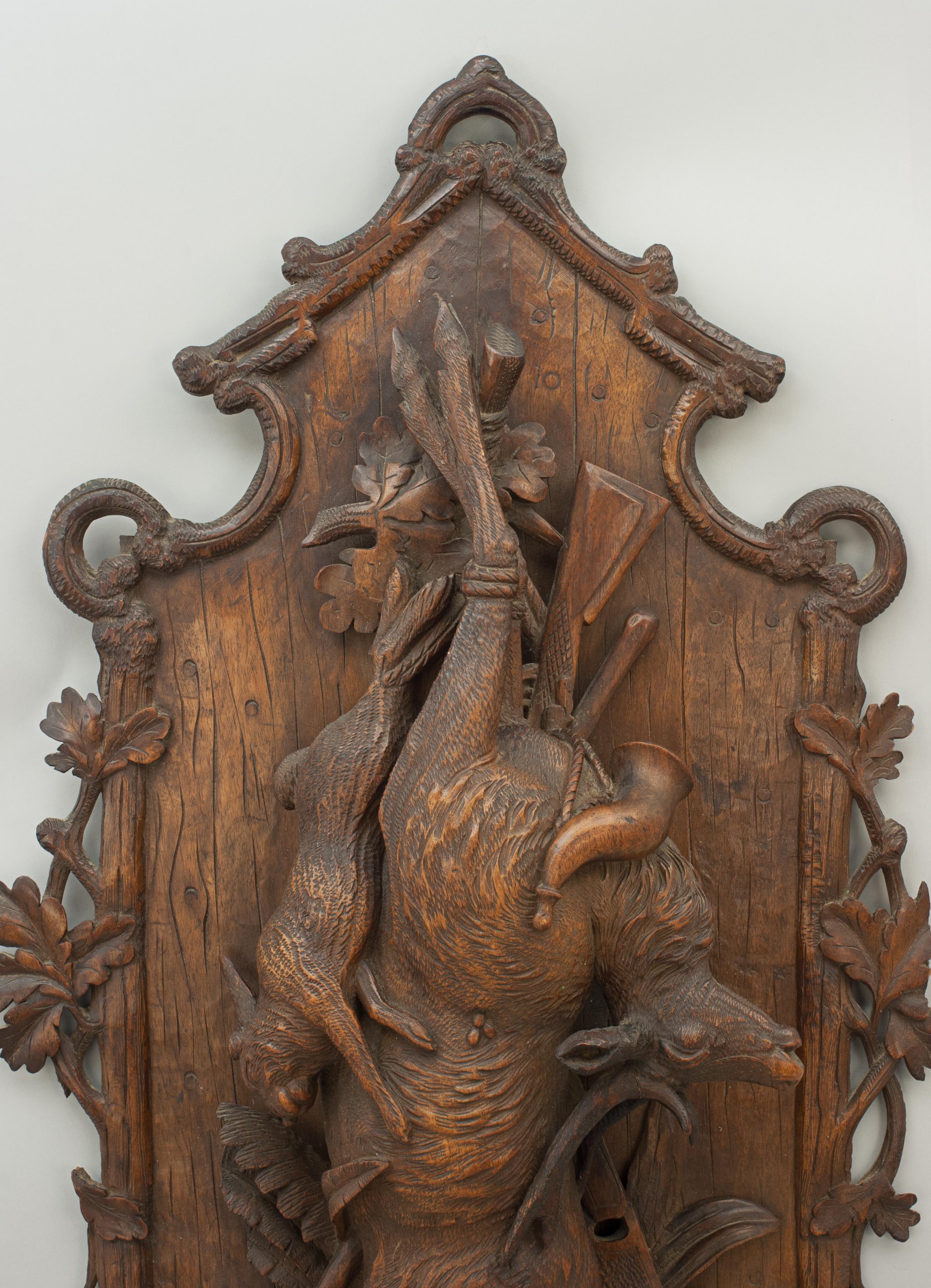 Large black forrest game plaque.
A charming large 19th century 'Black Forest' wall plaque of exceptional high quality. The beautiful antique wooden hunting wall plaque is with impressive carvings consisting of a deer, pheasant, hare, hunting horn,