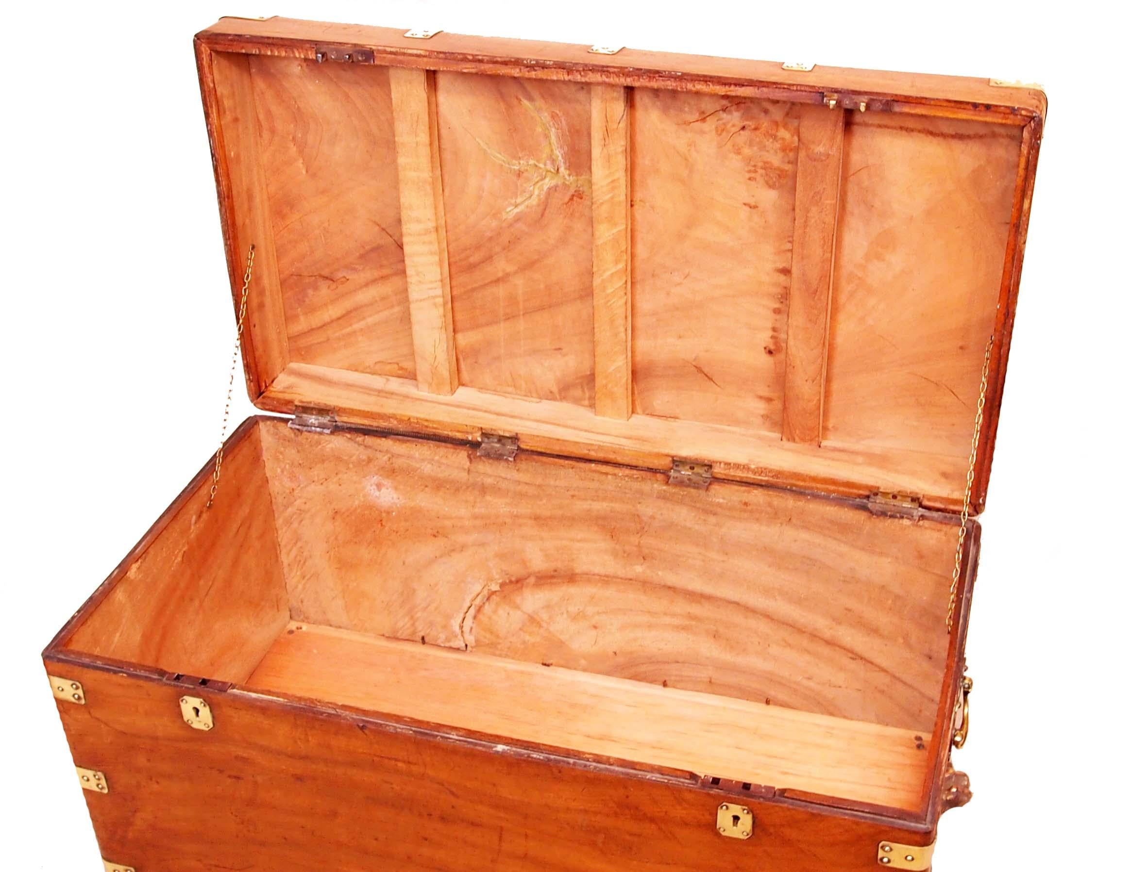 A delightful mid-19th century camphor wood military
Campaign trunk of good proportions having original
Brass bound decoration and carrying handles raised
On later brass paw feet

(This trunk would originally have been made for a sergeant
to