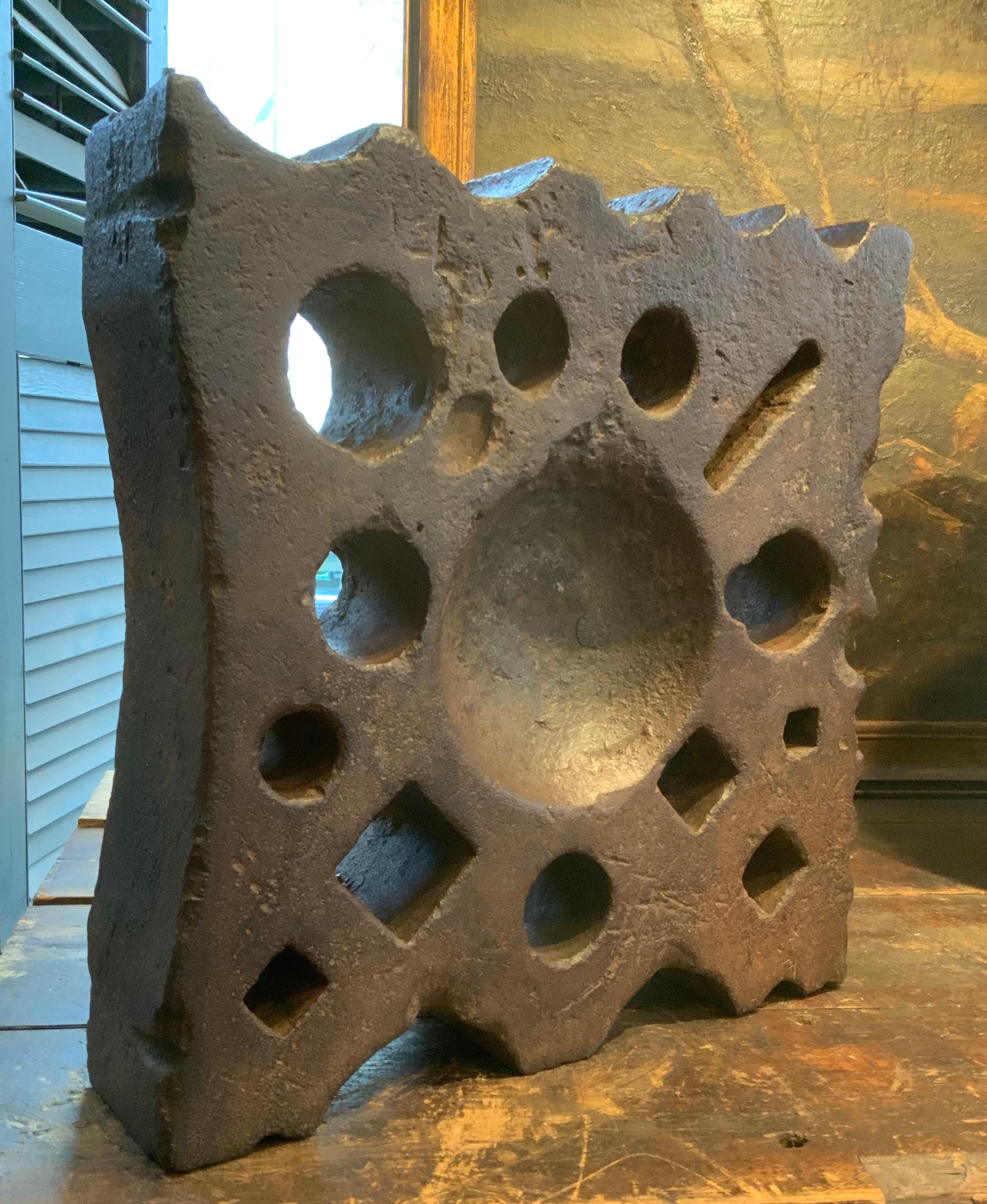 An amazing antique 19th century cast iron Swage Block. these stunning industrial age functional tools were used by blacksmiths and metal workers to bend and form steel of varying sizes and shapes, using the various holes and openings in the block,