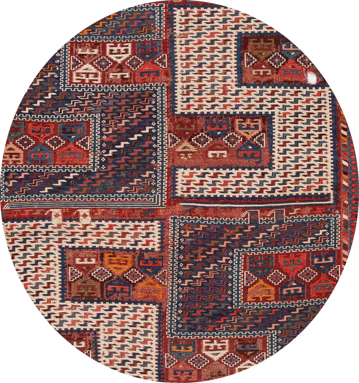 Beautiful antique Caucasian Verneh Sileh Soumak fragment rug, hand knotted wool with a rust field, blue, ivory and orange accents in a multi medallion geometric design,

circa 180s.
This rug measured 3' 10