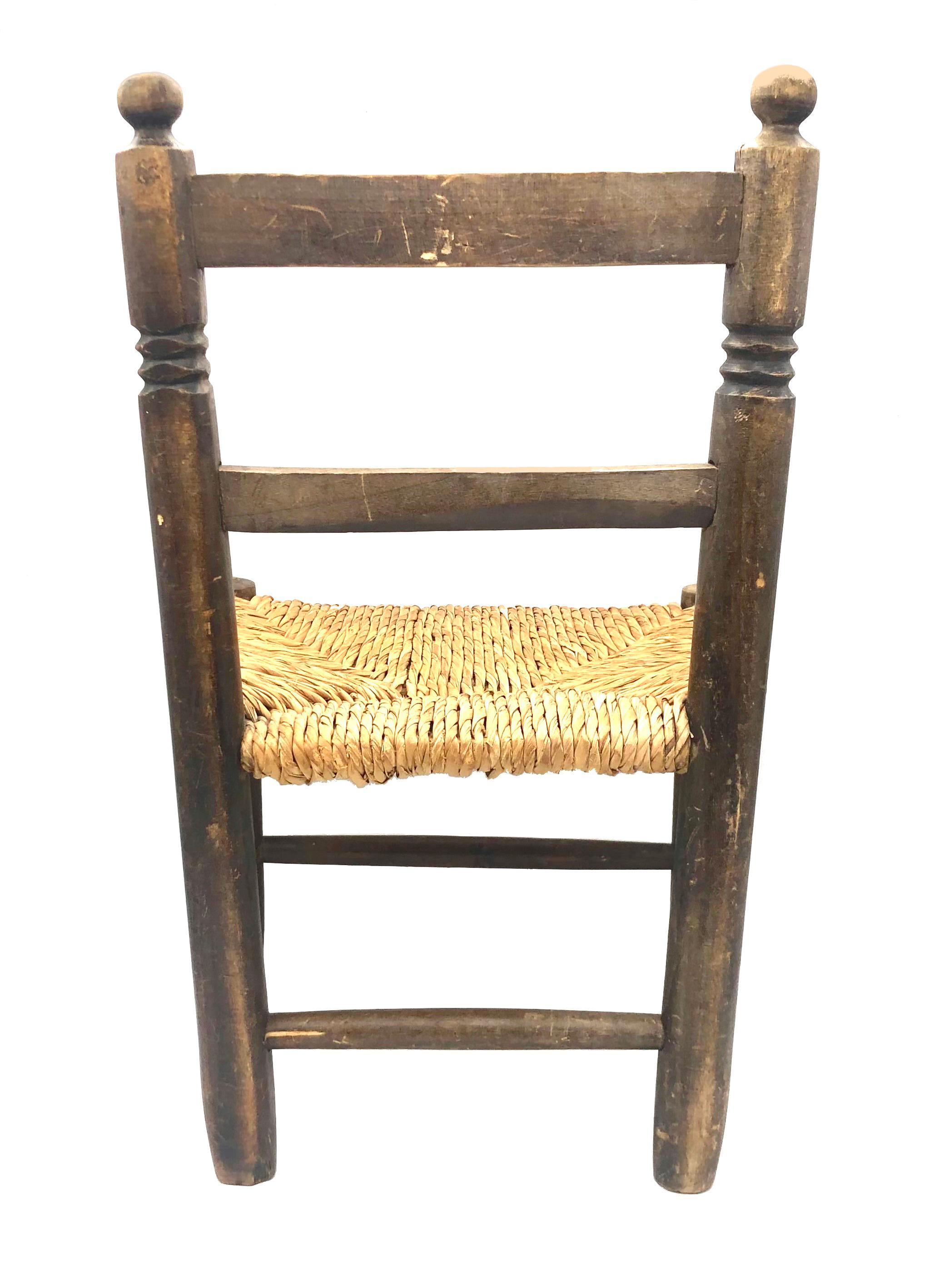 Country Antique 19th century Children's Armchair Carved Oak Wicker Seat For Sale