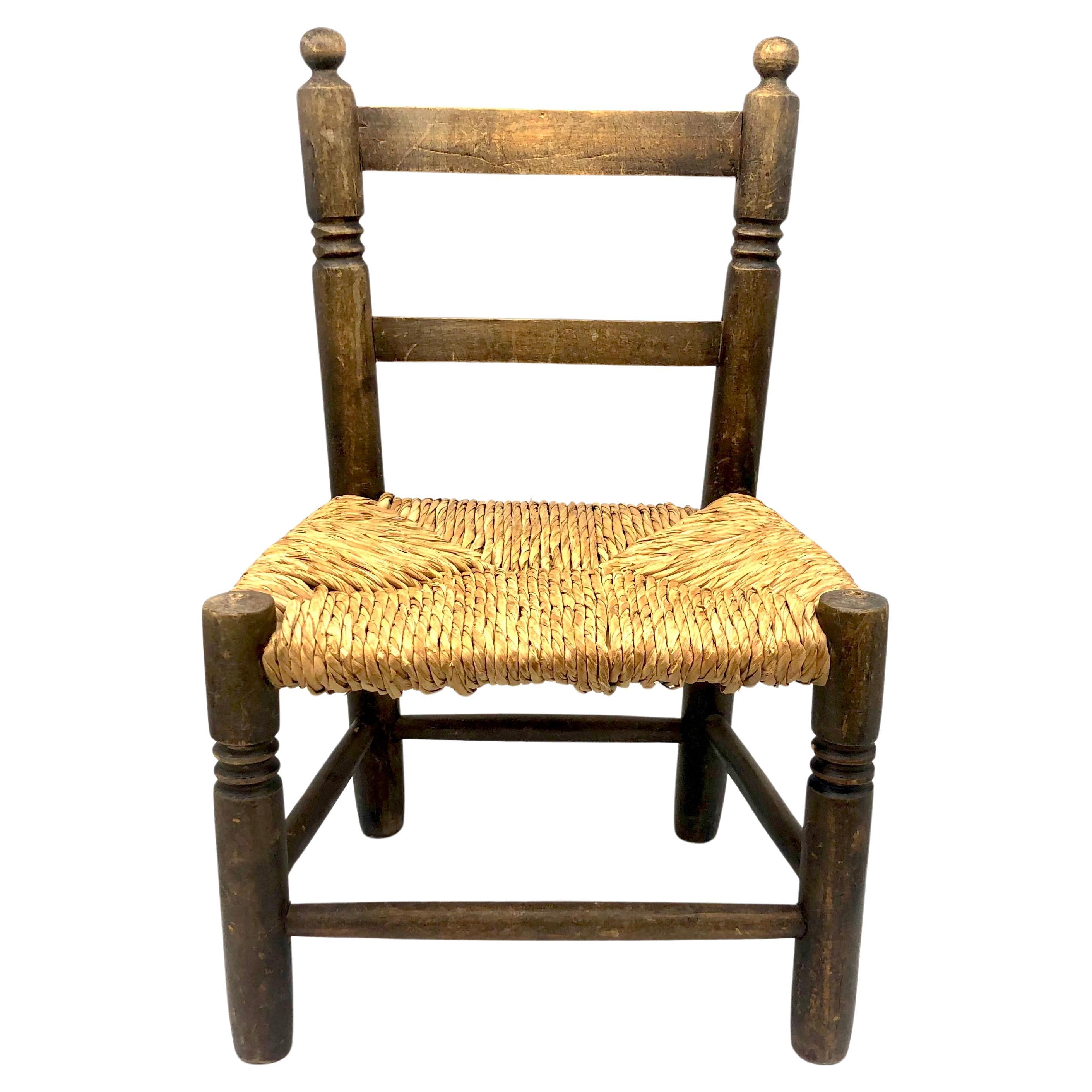 Antique 19th century Children's Armchair Carved Oak Wicker Seat For Sale