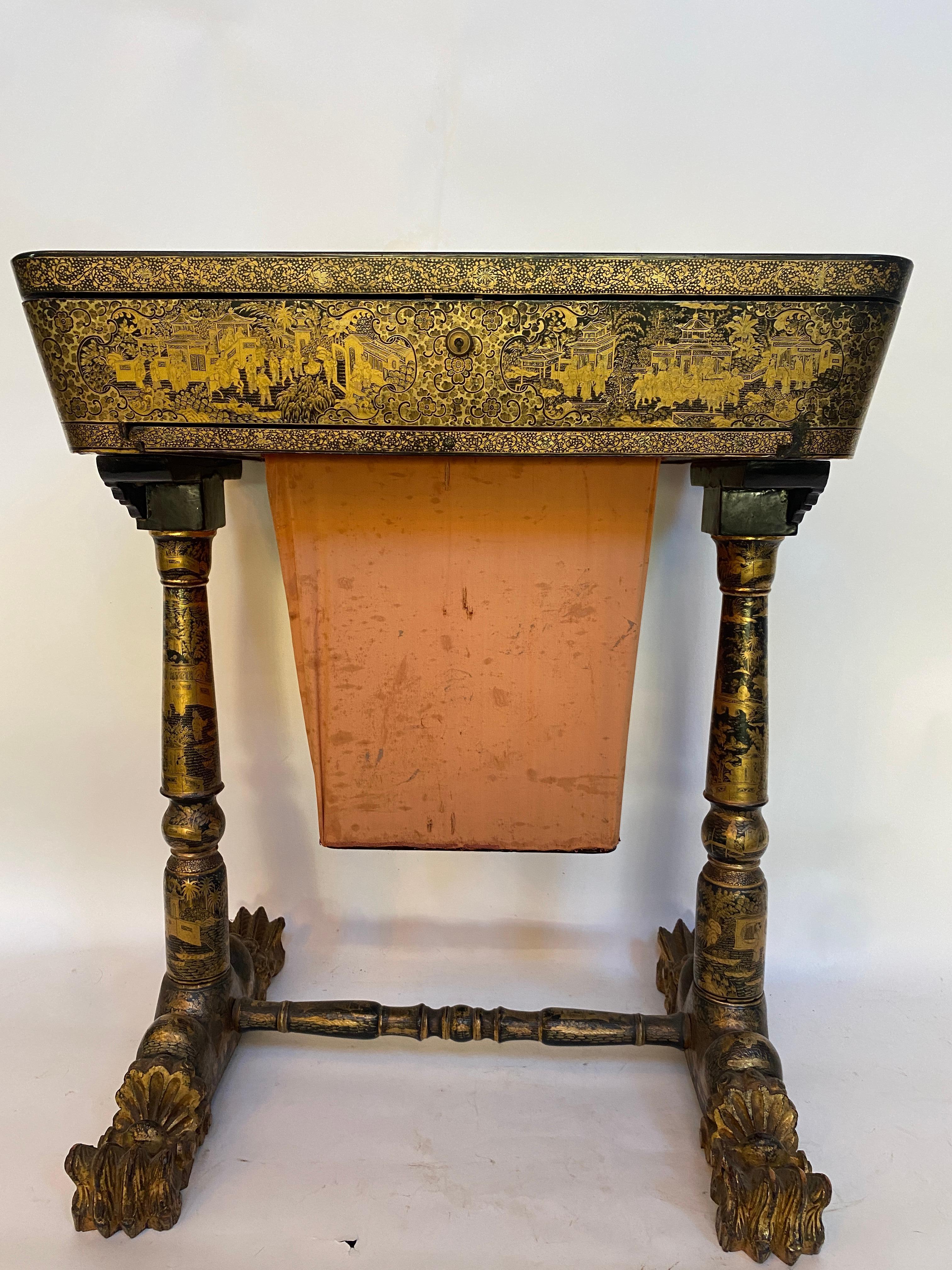 Antique 19th century Chinese lacquer sewing table with hand painted scenes and beautiful legs. Unique Gilt export black lacquer all-over the table. very good condition gilt .  see more photos . 