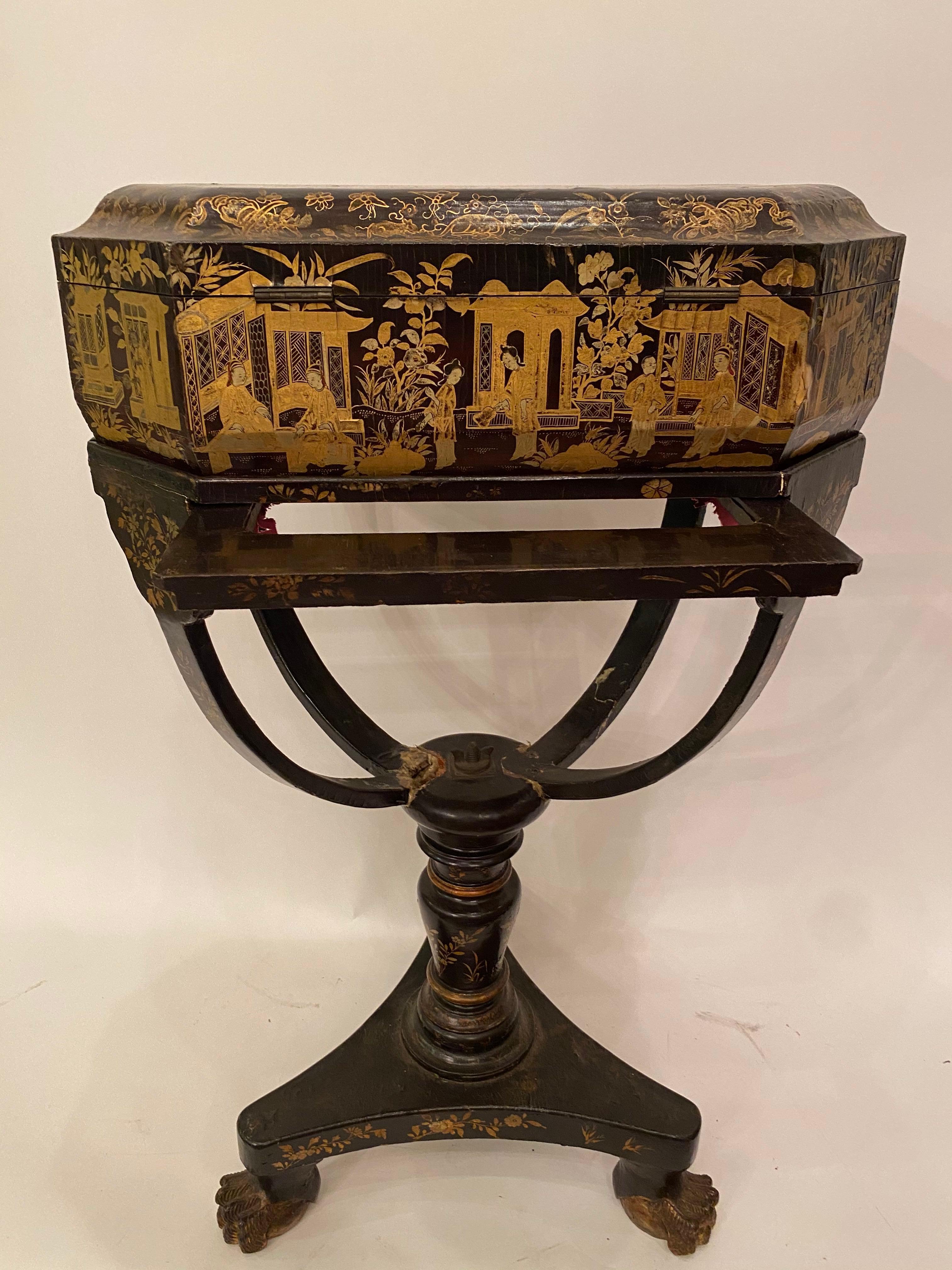 Antique 19th century Chinese lacquer sewing table with hand painted scenes and beautiful legs. Gilt export black lacquer all-over the table. The sewing box can be take off. It is on the original stand. Somewhere maybe broke but it be fixed, please