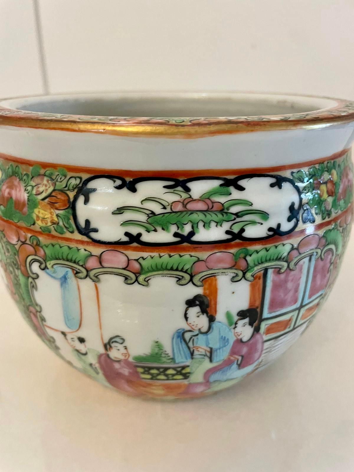Antique 19th century Chinese quality Canton Famille Rose jardinière decorated with pretty hand painted panels showing scenes of Chinese people, birds, butterflies and flowers using the wonderful Famille Rose colours and gold gilding 

A lovely