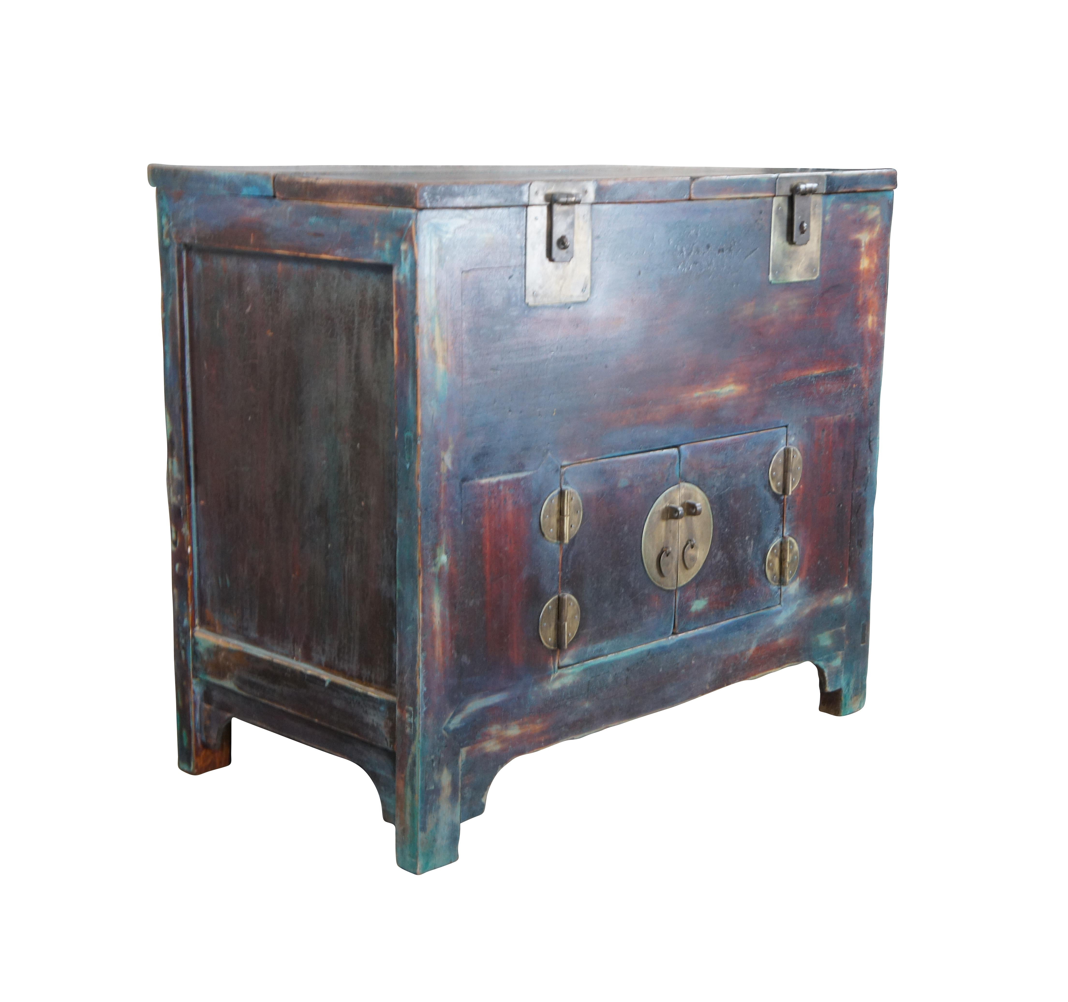 Late Qing Dynasty iridescent painted Elm Money Trunk / Storage Chest. Made in Shandong East China, circa 1870s. Features two upper compartments and lower cabinet for accessory storage. Upper compartments have brass latches allowing them to be locked