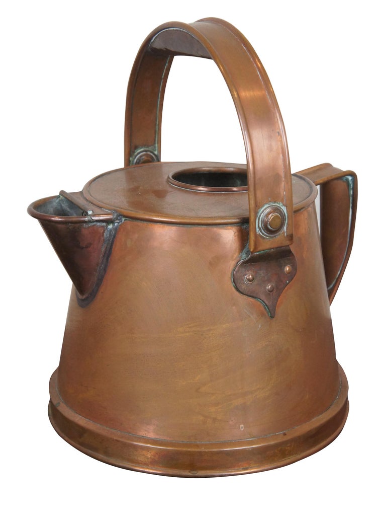 Antique copper coffee kettle used to brew over an open flame in the late 19th century.  Measures: 14