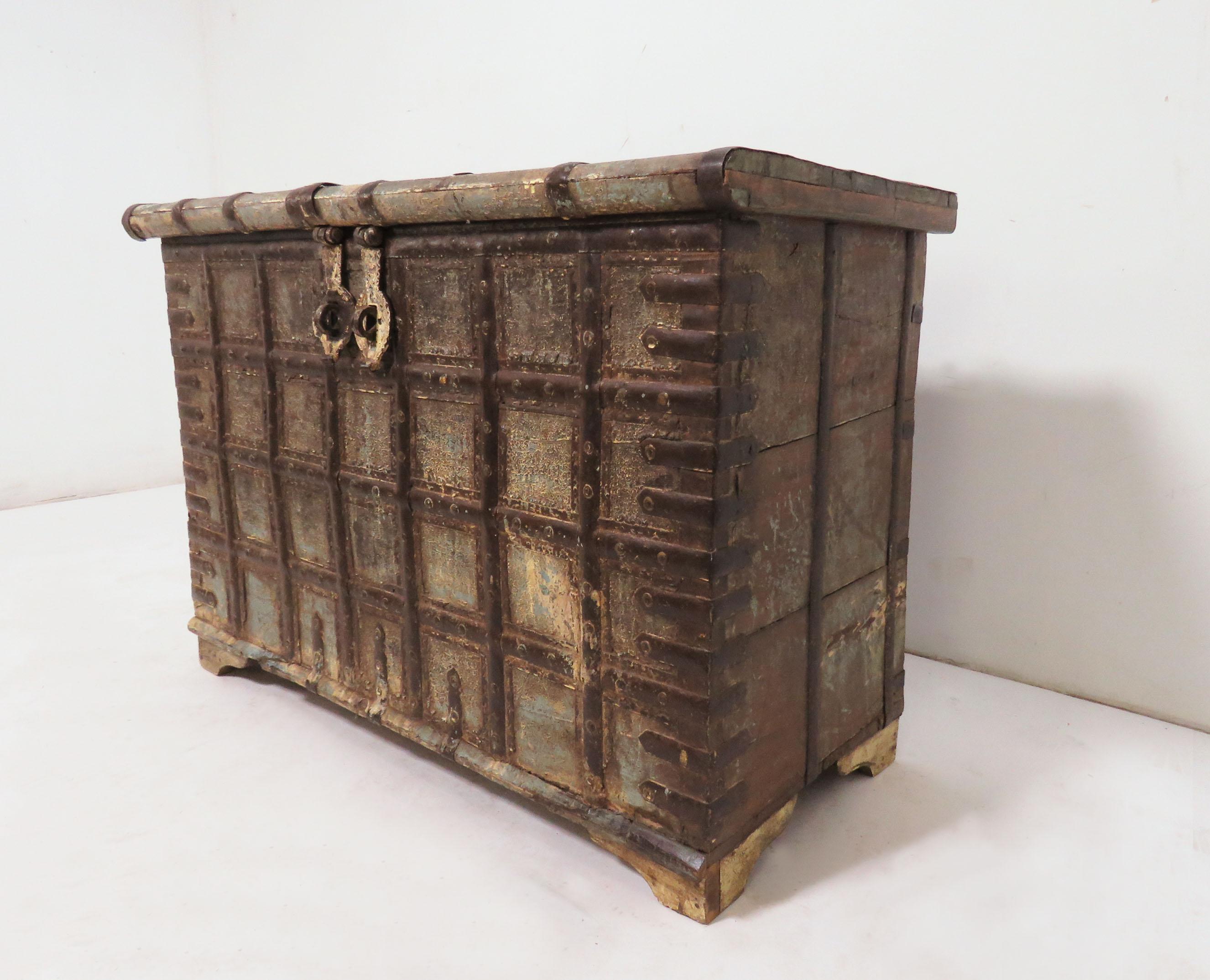 Antique 19th century Damchiya dowry chest, from Rajasthan, India. Faded polychrome paint with patinated strap work.