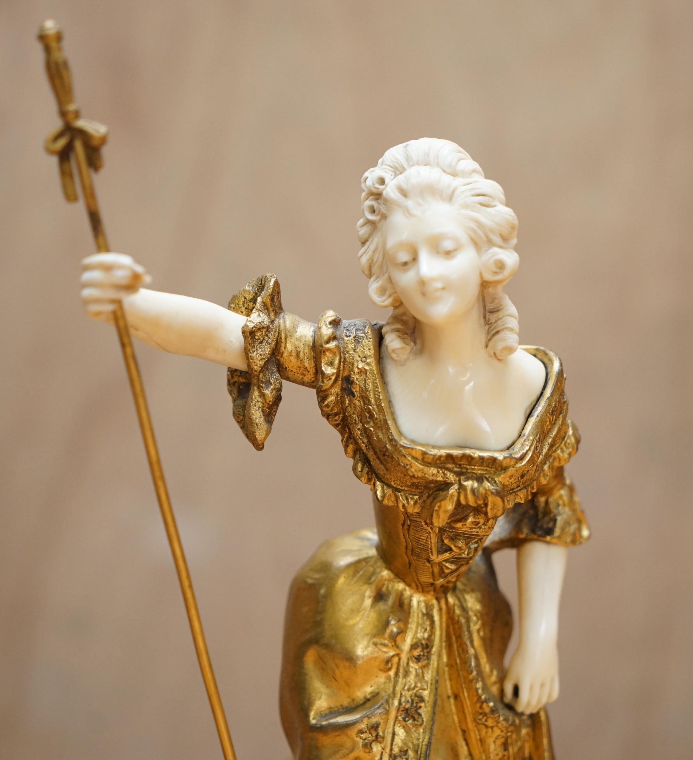 Royal House Antiques

Royal House Antiques is delighted to offer for sale this absolutely stunning, original, signed and stamped Dominique Alonzo 19th gold gilt bronze statue of a lady in 18th century dress

A truly stunning and highly collectable