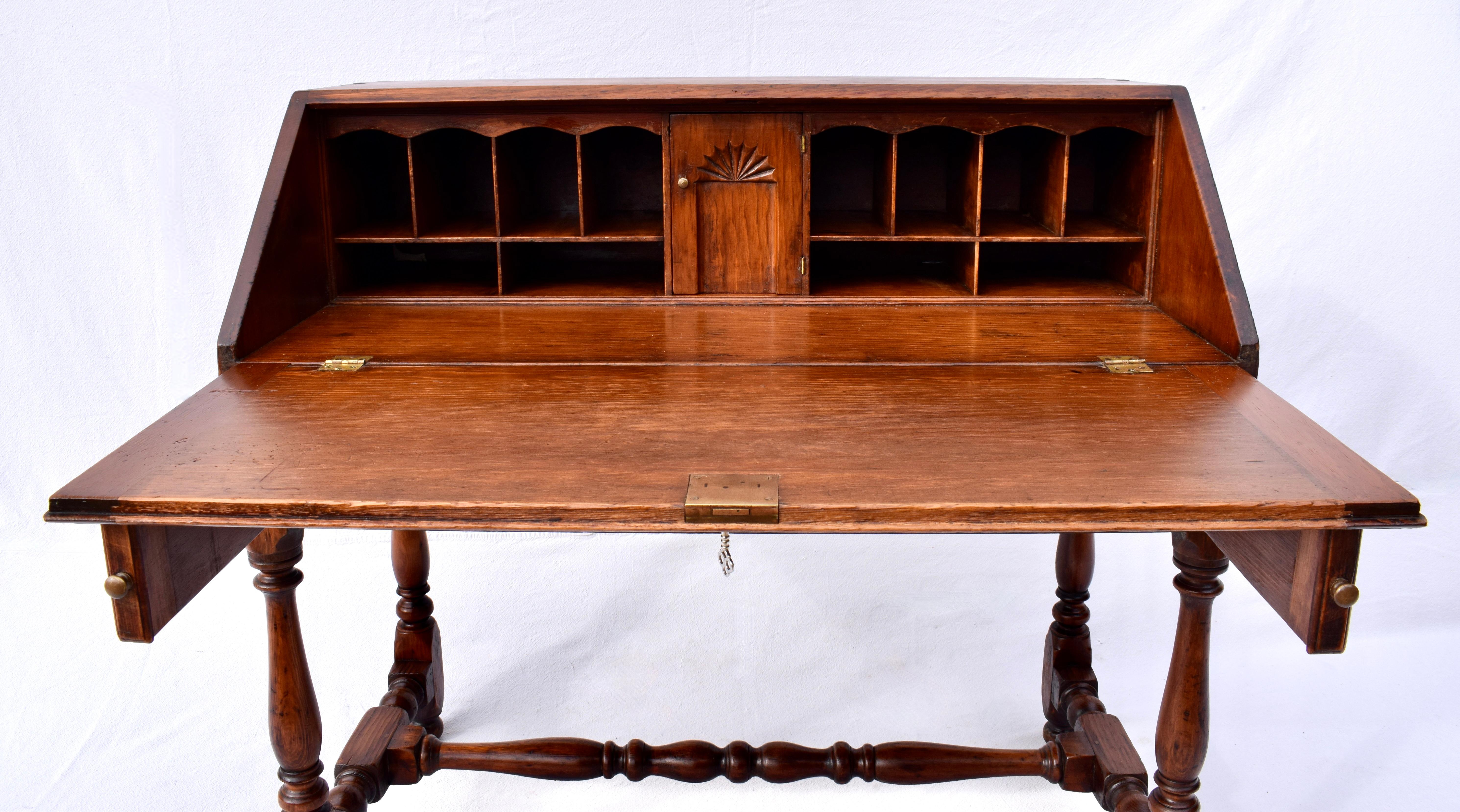 19th C. Antique American Pine slant top drop down desk with exposed dovetail joinery, generous single drawer, lovely turnings to the legs & stretcher & ball feet. Desk open dimensions: 33.5