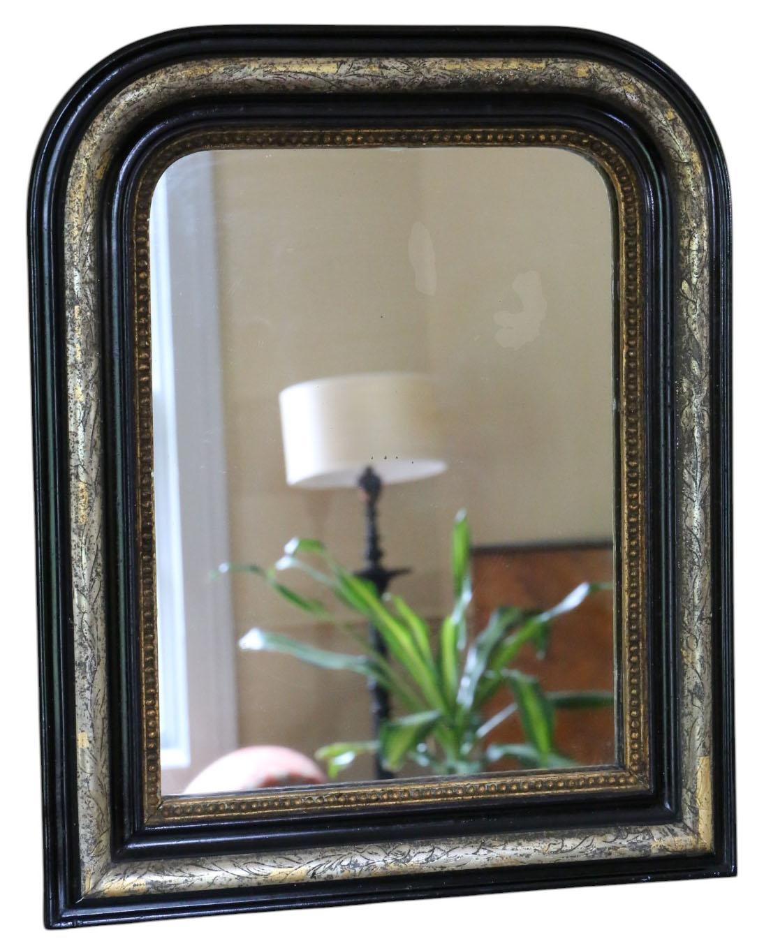 Antik 19. Jahrhundert Ebonisiert und vergoldet Overmantel Wandspiegel - Schwarz & Gold Frame

Dies ist ein antiker schwarzer und vergoldeter Obermantelspiegel aus dem 19. Durch sein klassisches Design kann er über einem Kamin, in einer Eingangshalle