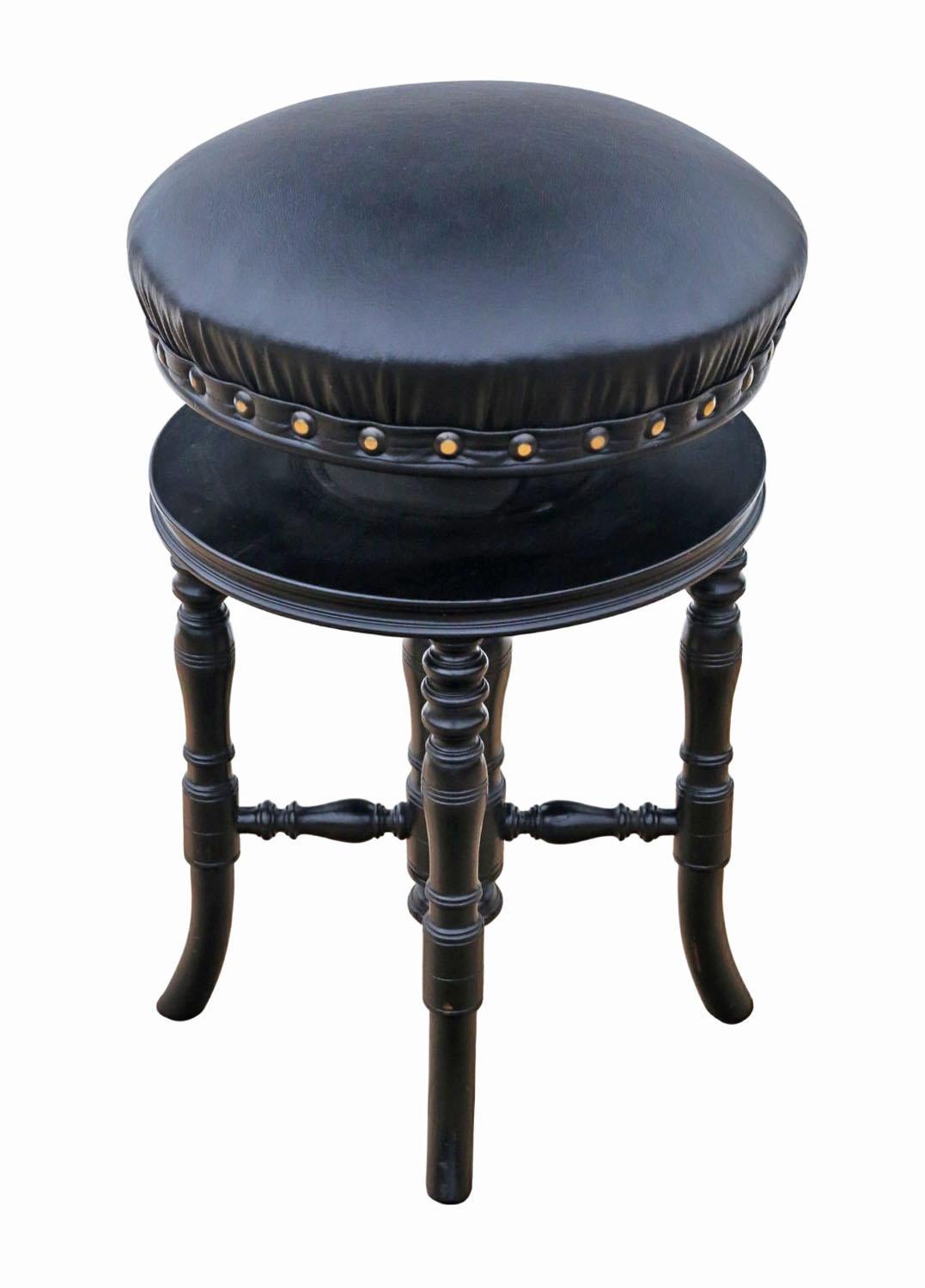 Antique 19th Century Ebonised Mahogany Revolving Adjustable Piano Stool – Fine Quality

A rare decorative find, this 19th-century ebonised mahogany piano stool is full of age, colour, and patina. Featuring an adjustable revolving mechanism and a
