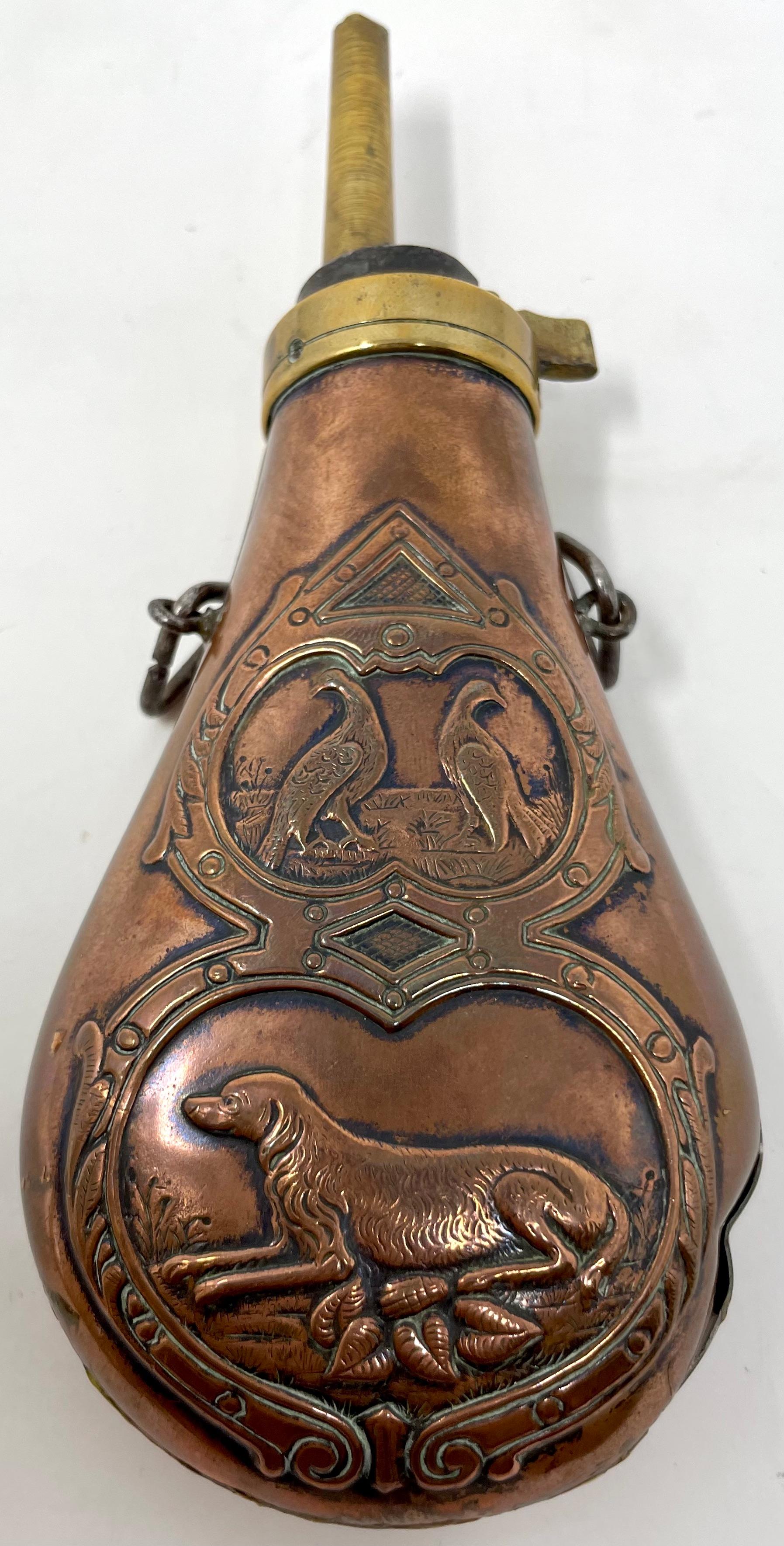 https://a.1stdibscdn.com/antique-19th-century-embossed-copper-and-brass-gun-powder-flask-for-sale-picture-2/f_28543/f_290649921654894942953/IMG_6172_master.jpeg