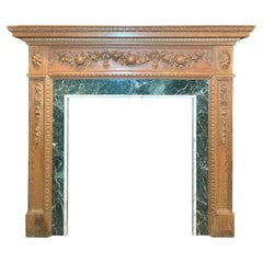 Antique 19th Century English Adams Style Carved Wood Mantel with Marble Inset.
