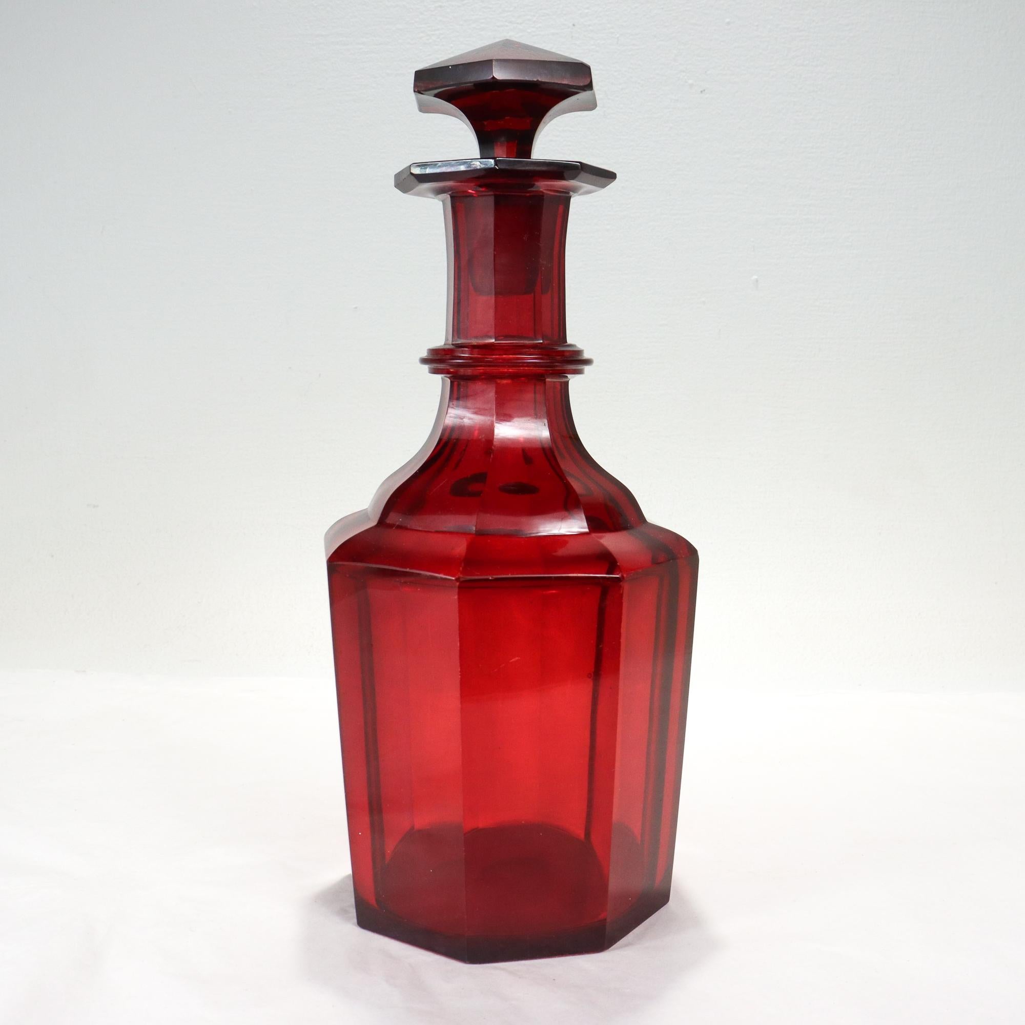 Antique 19th Century English Faceted Ruby Red Cut Glass Wine Decanter  In Fair Condition For Sale In Philadelphia, PA