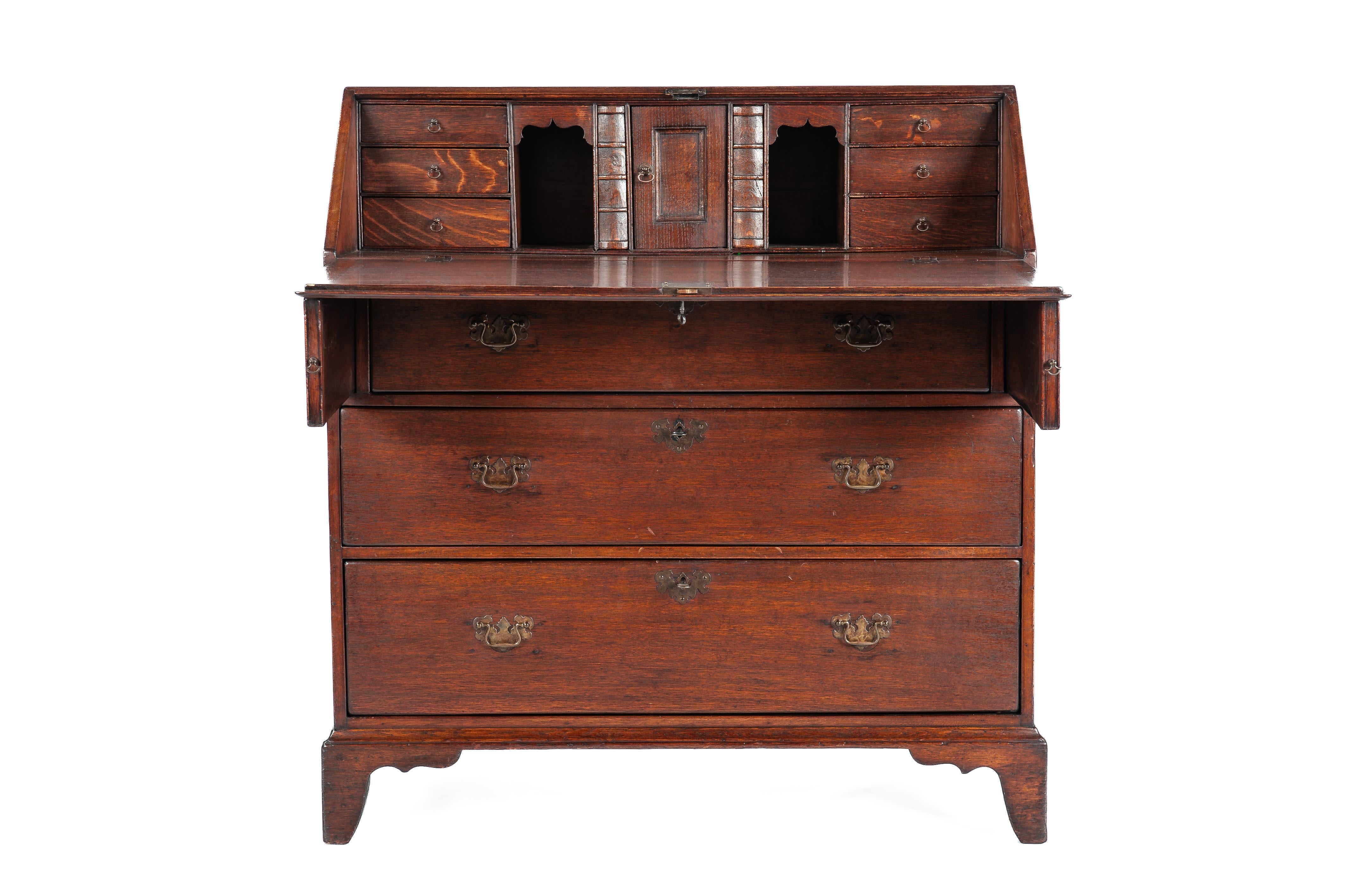 Polished Antique 19th century English George III warm oak Slant front secretary desk