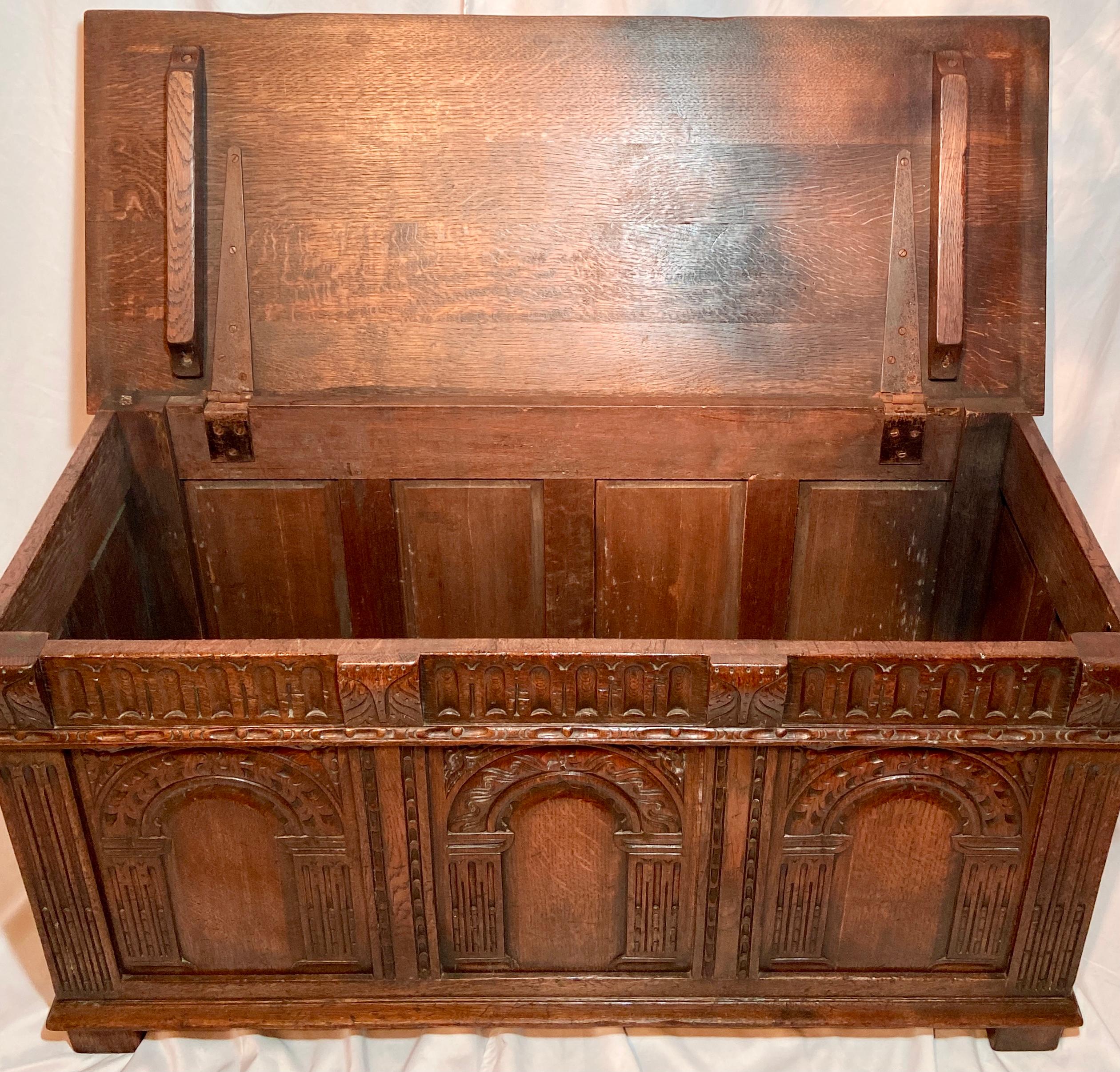 Antique 19th century English Jacobean carved oak chest.