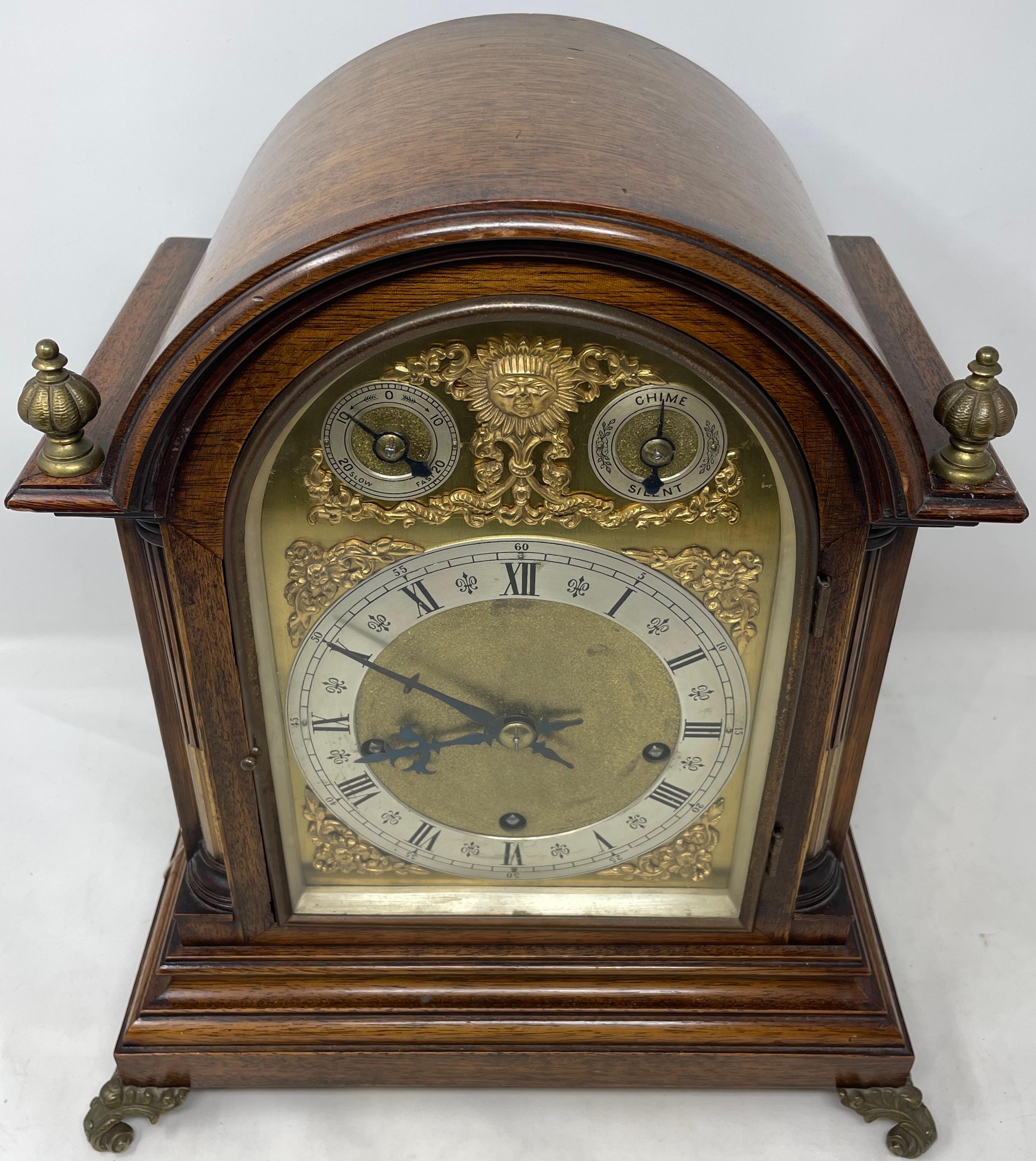 Antique 19th century English mahogany and gold bronze bracket clock, circa 1880.