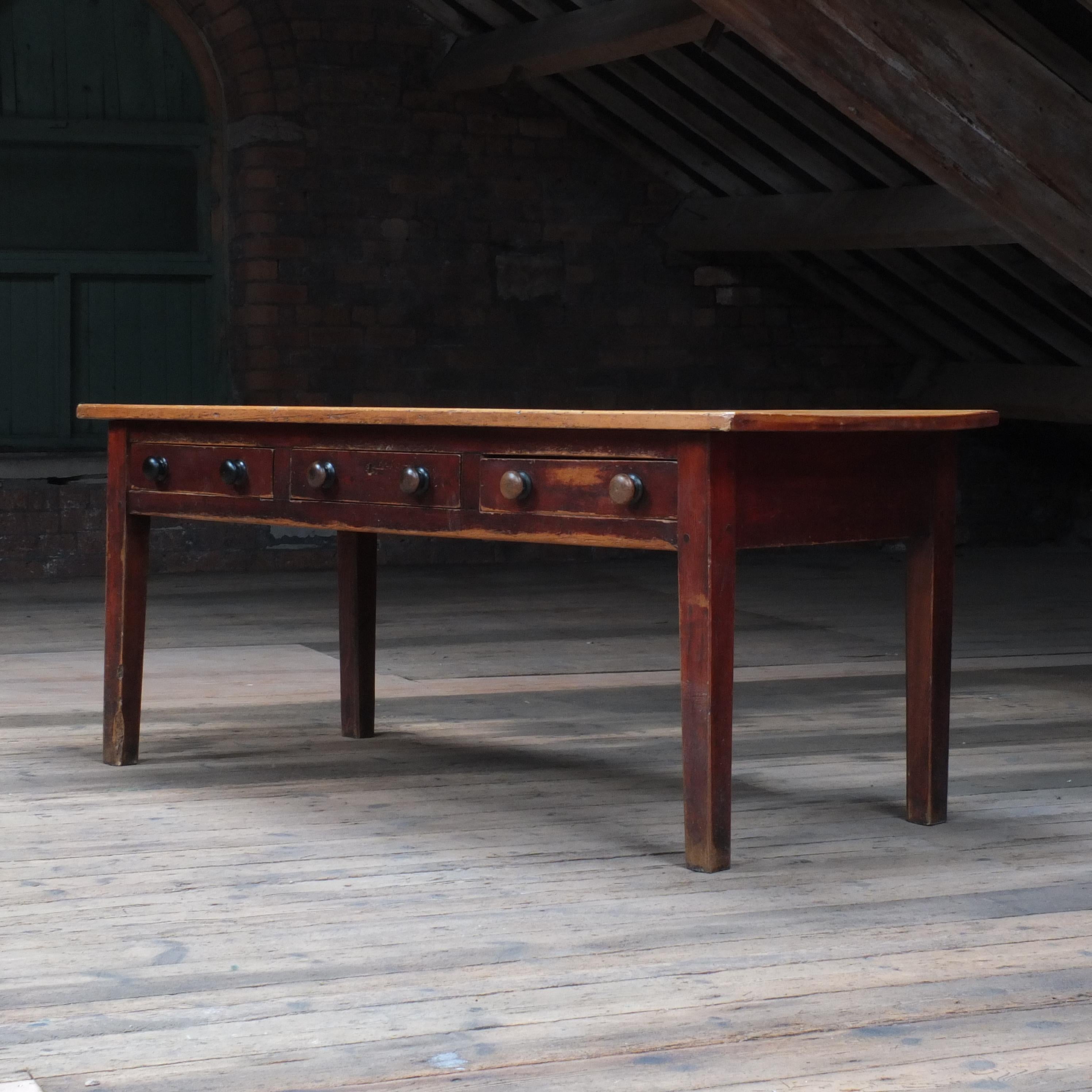 A 19th century pitch pine farm house prep table in beautifully time worn condition. In good structural condition throughout. Some historic worm to the top but its long gone and doesn't effect its use. This table was originally made to prepare food