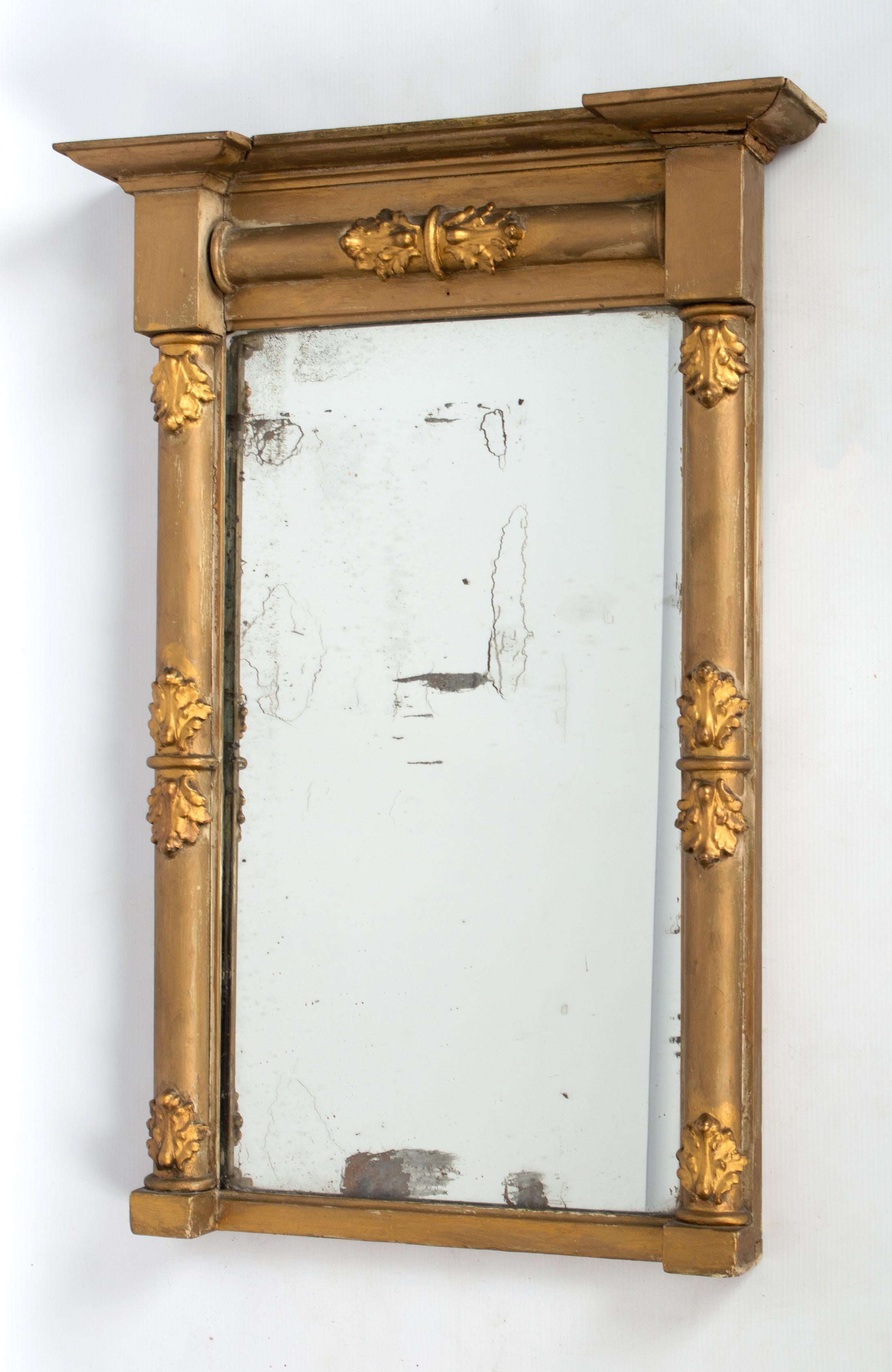 Antique 19th Century English Regency Gesso Pier Mirror C.1820

With original mirror plate, showing ageing. The gilded gesso frame with some distressing, wear to top right corner, and evidence of historic over painting. Please see photos.

