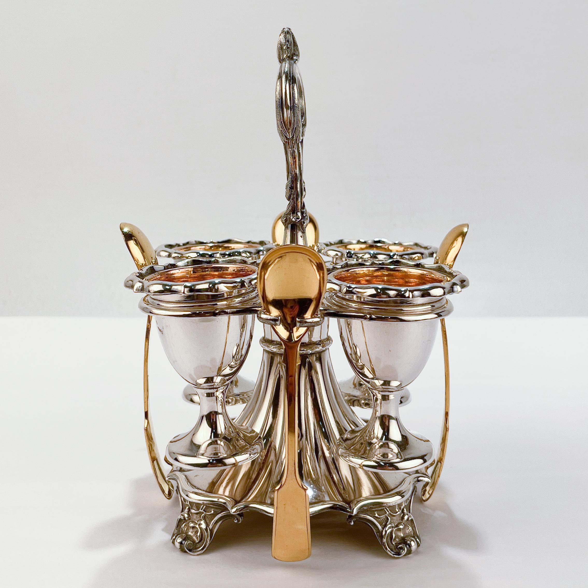 Offered here for your consideration is a fine antique egg cup stand.

Comprising four egg cups with gilt interiors, four gilt egg spoons, and a cup holder or stand.  

Simply a wonderful piece for a regal breakfast!

Date:
19th Century

Overall