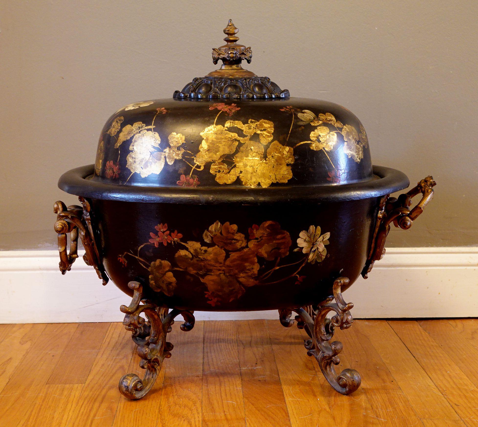 English hand-painted and gold gilt tole coal hod with original, original gold gilt handles and ending on original gold gilt scrolled floral feet, with oval domed cover and handle and conforming bowl section, oval footed base, scroll handles, gilt
